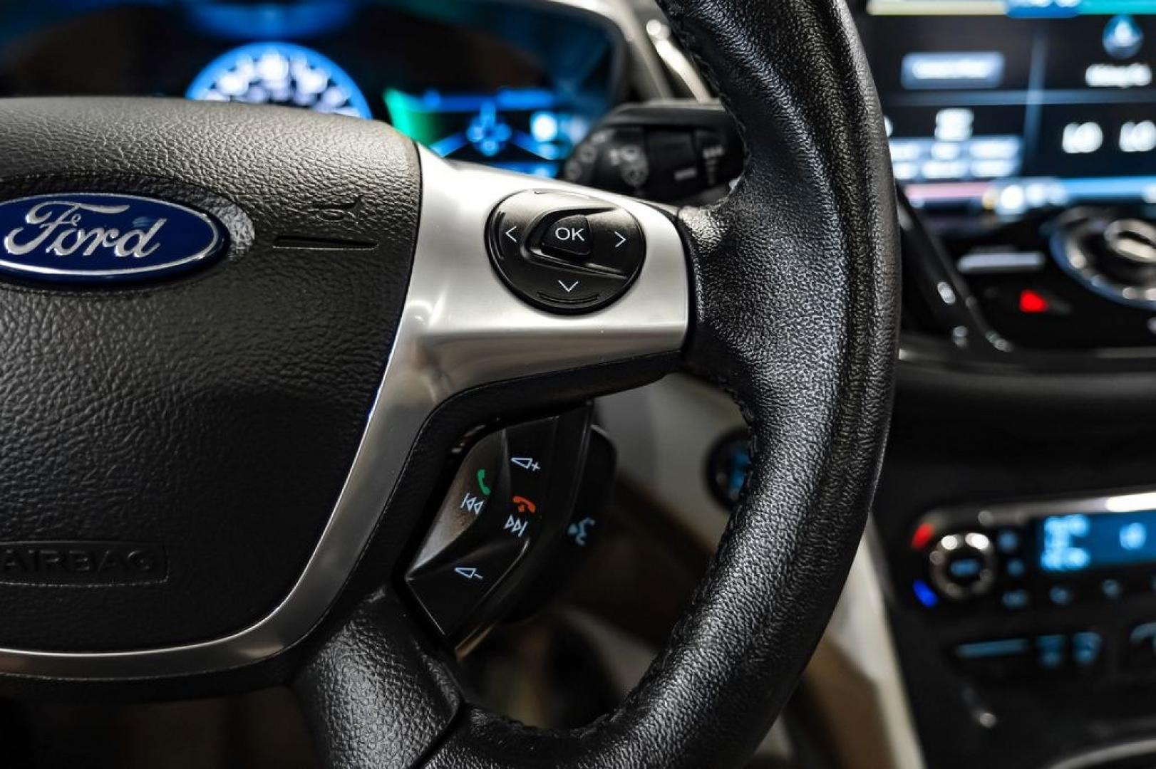 2015 Magnetic /Medium Light Stone Ford C-Max Energi SEL (1FADP5CUXFL) with an I4 Hybrid engine, CVT transmission, located at 15300 Midway Rd., Addison, TX, 75001, (972) 702-0011, 32.958321, -96.838074- Photo#17