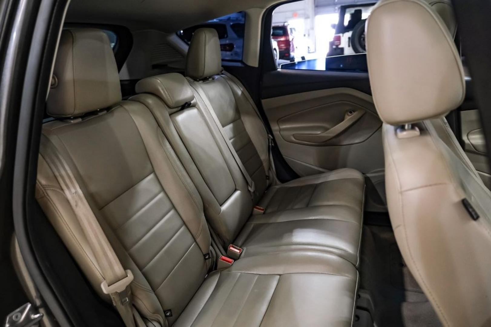2015 Magnetic /Medium Light Stone Ford C-Max Energi SEL (1FADP5CUXFL) with an I4 Hybrid engine, CVT transmission, located at 15300 Midway Rd., Addison, TX, 75001, (972) 702-0011, 32.958321, -96.838074- Photo#32