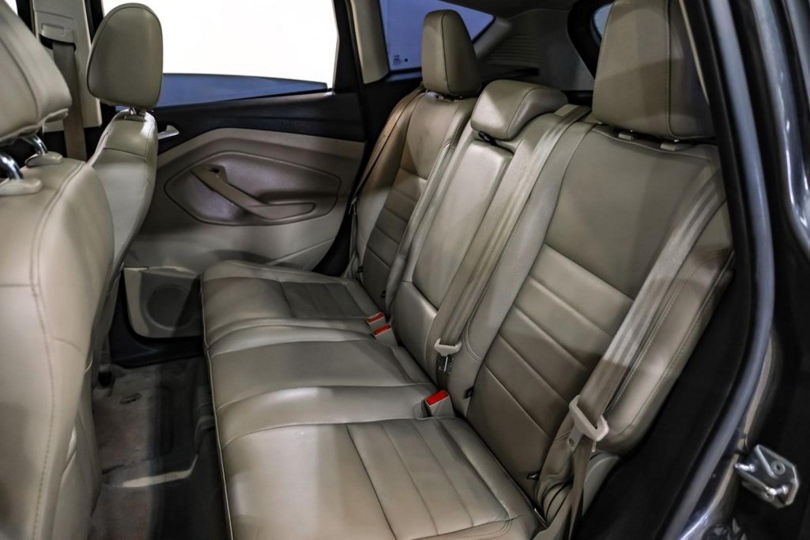 2015 Magnetic /Medium Light Stone Ford C-Max Energi SEL (1FADP5CUXFL) with an I4 Hybrid engine, CVT transmission, located at 15300 Midway Rd., Addison, TX, 75001, (972) 702-0011, 32.958321, -96.838074- Photo#35