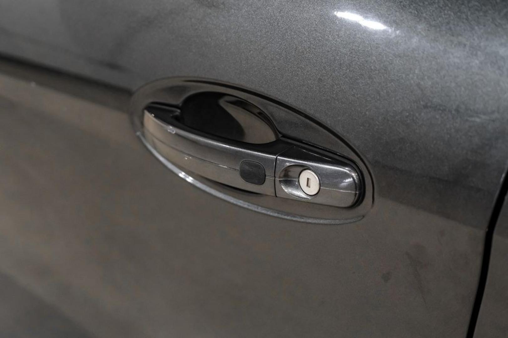 2015 Magnetic /Medium Light Stone Ford C-Max Energi SEL (1FADP5CUXFL) with an I4 Hybrid engine, CVT transmission, located at 15300 Midway Rd., Addison, TX, 75001, (972) 702-0011, 32.958321, -96.838074- Photo#37