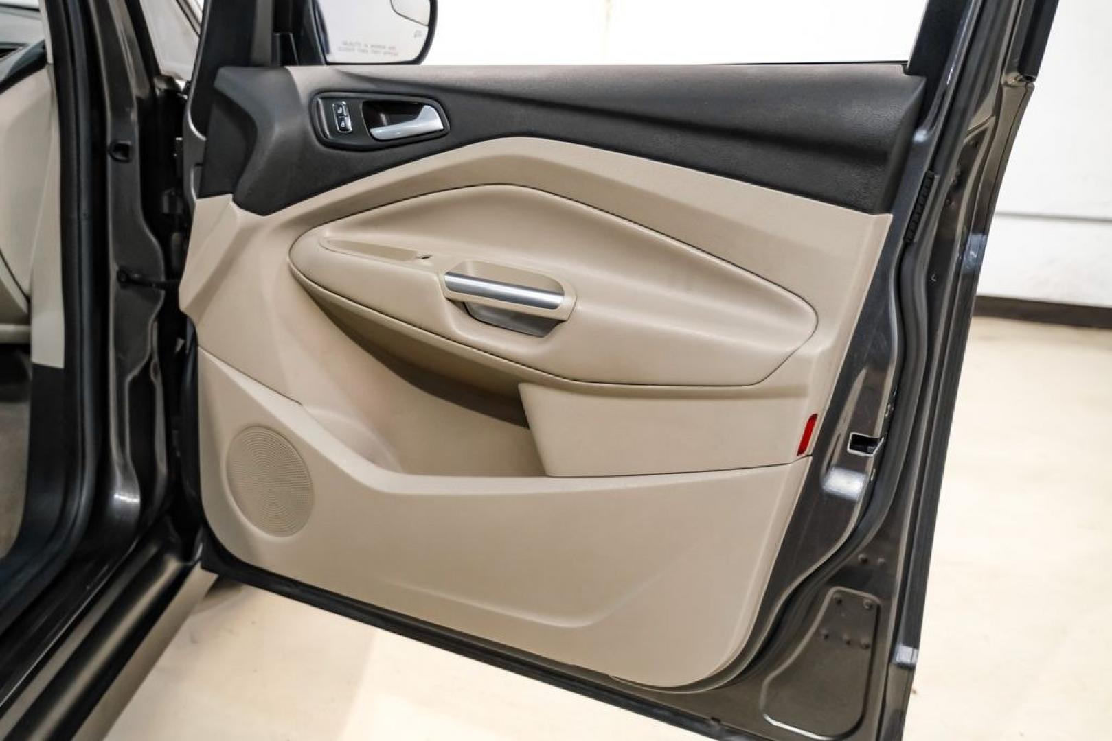2015 Magnetic /Medium Light Stone Ford C-Max Energi SEL (1FADP5CUXFL) with an I4 Hybrid engine, CVT transmission, located at 15300 Midway Rd., Addison, TX, 75001, (972) 702-0011, 32.958321, -96.838074- Photo#40
