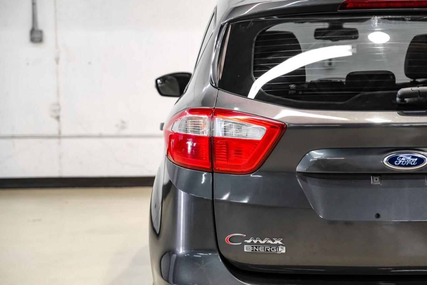 2015 Magnetic /Medium Light Stone Ford C-Max Energi SEL (1FADP5CUXFL) with an I4 Hybrid engine, CVT transmission, located at 15300 Midway Rd., Addison, TX, 75001, (972) 702-0011, 32.958321, -96.838074- Photo#44