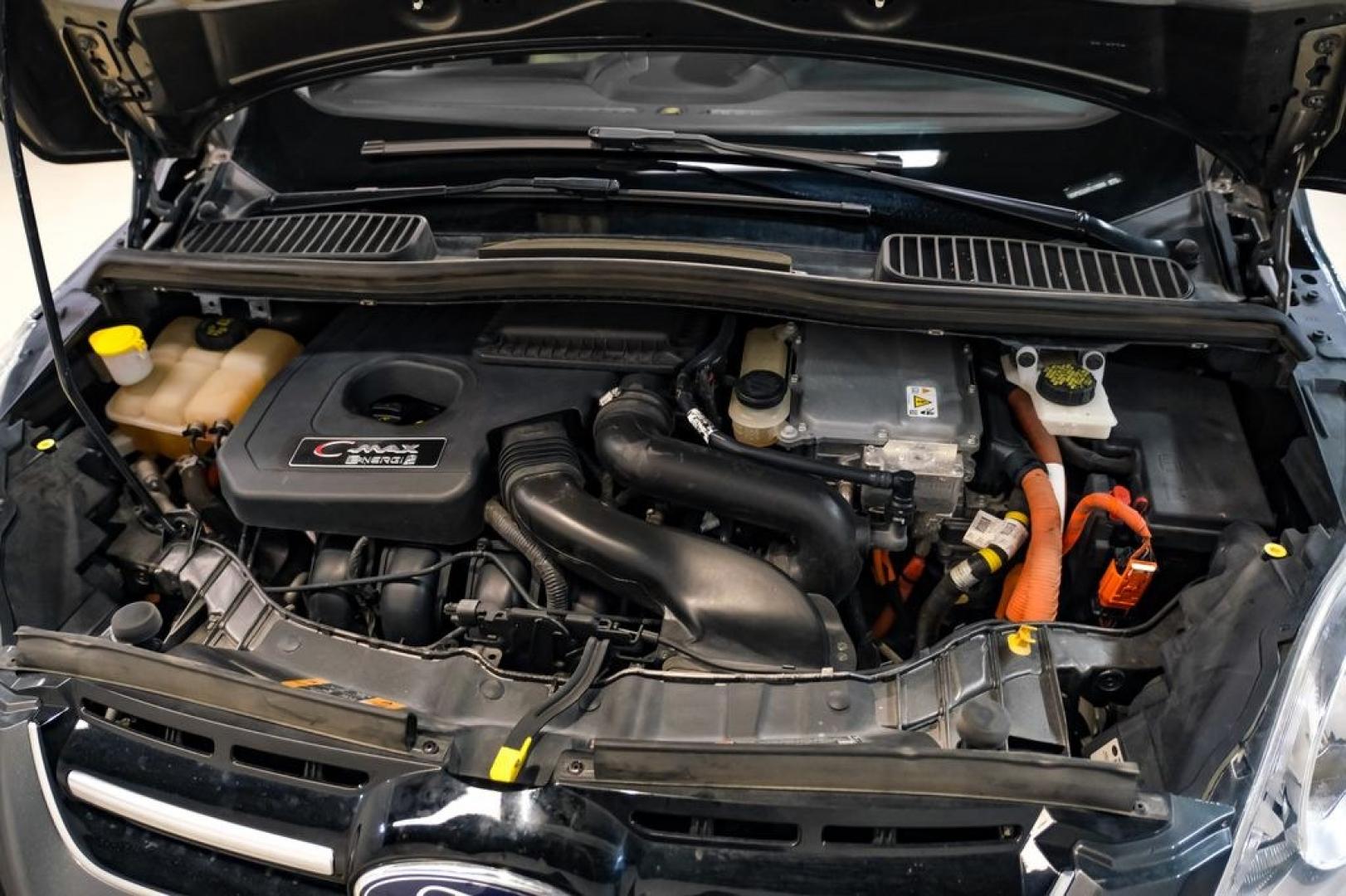 2015 Magnetic /Medium Light Stone Ford C-Max Energi SEL (1FADP5CUXFL) with an I4 Hybrid engine, CVT transmission, located at 15300 Midway Rd., Addison, TX, 75001, (972) 702-0011, 32.958321, -96.838074- Photo#45