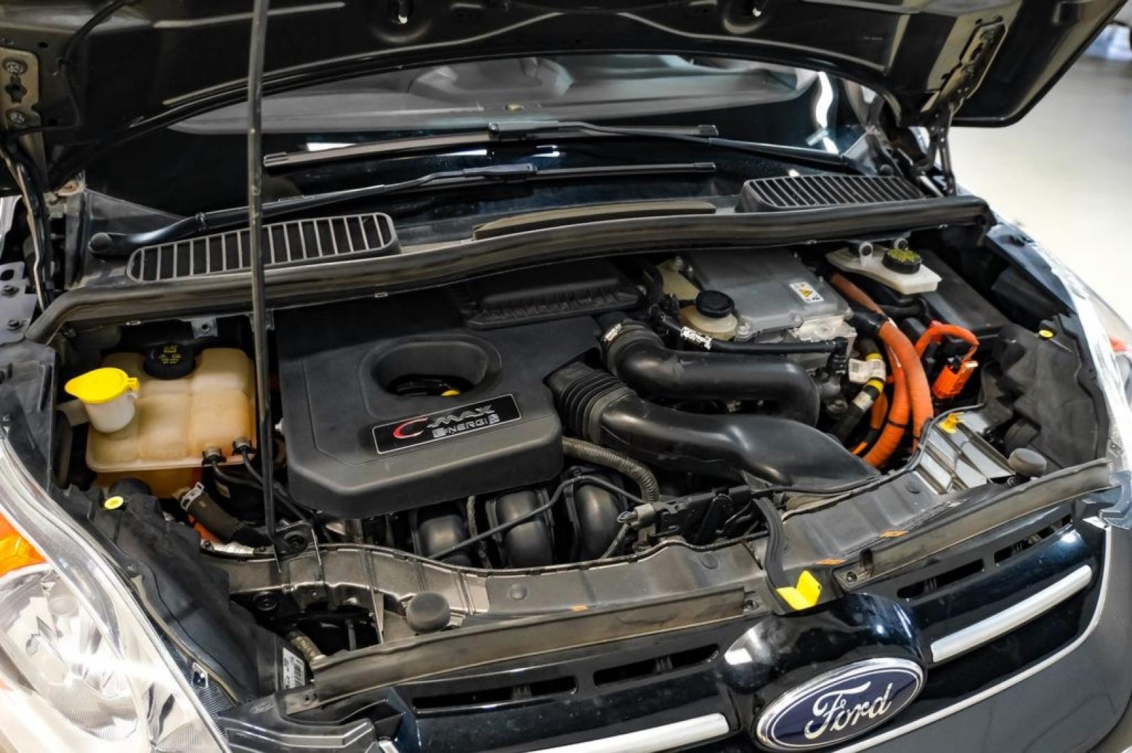 2015 Magnetic /Medium Light Stone Ford C-Max Energi SEL (1FADP5CUXFL) with an I4 Hybrid engine, CVT transmission, located at 15300 Midway Rd., Addison, TX, 75001, (972) 702-0011, 32.958321, -96.838074- Photo#47