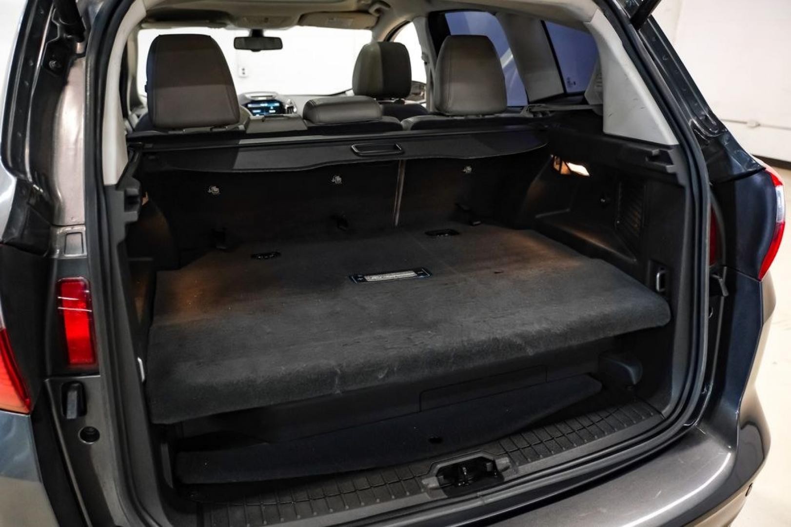2015 Magnetic /Medium Light Stone Ford C-Max Energi SEL (1FADP5CUXFL) with an I4 Hybrid engine, CVT transmission, located at 15300 Midway Rd., Addison, TX, 75001, (972) 702-0011, 32.958321, -96.838074- Photo#49