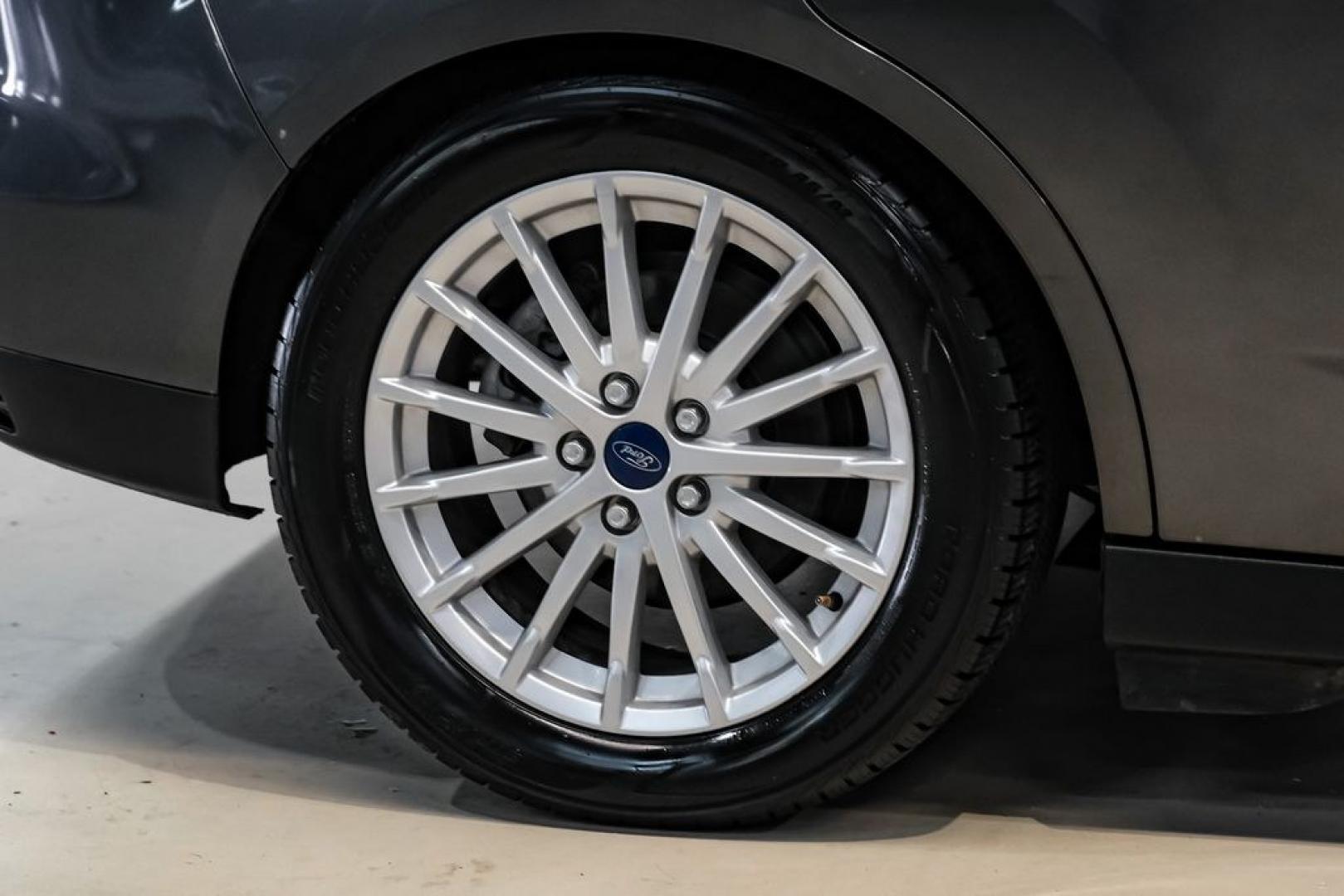 2015 Magnetic /Medium Light Stone Ford C-Max Energi SEL (1FADP5CUXFL) with an I4 Hybrid engine, CVT transmission, located at 15300 Midway Rd., Addison, TX, 75001, (972) 702-0011, 32.958321, -96.838074- Photo#51