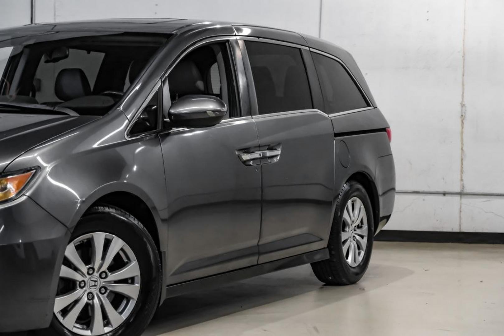 2014 Modern Steel Metallic /Beige Honda Odyssey EX-L (5FNRL5H69EB) with an 3.5L V6 SOHC i-VTEC 24V engine, Automatic transmission, located at 15300 Midway Rd., Addison, TX, 75001, (972) 702-0011, 32.958321, -96.838074- Photo#6