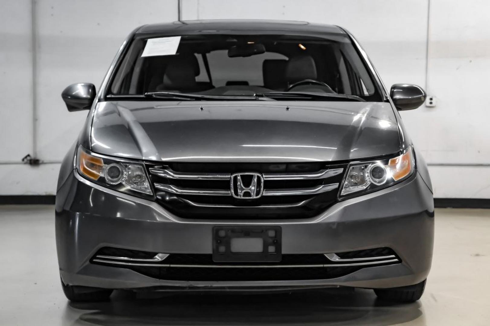 2014 Modern Steel Metallic /Beige Honda Odyssey EX-L (5FNRL5H69EB) with an 3.5L V6 SOHC i-VTEC 24V engine, Automatic transmission, located at 15300 Midway Rd., Addison, TX, 75001, (972) 702-0011, 32.958321, -96.838074- Photo#7