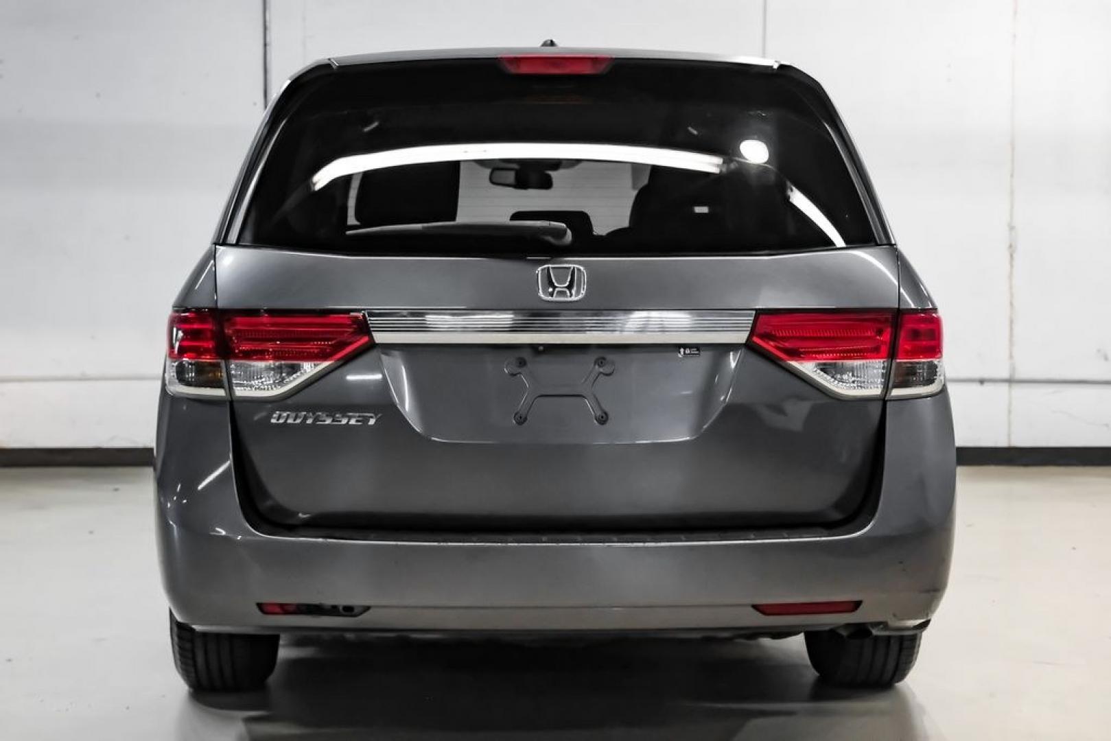 2014 Modern Steel Metallic /Beige Honda Odyssey EX-L (5FNRL5H69EB) with an 3.5L V6 SOHC i-VTEC 24V engine, Automatic transmission, located at 15300 Midway Rd., Addison, TX, 75001, (972) 702-0011, 32.958321, -96.838074- Photo#11