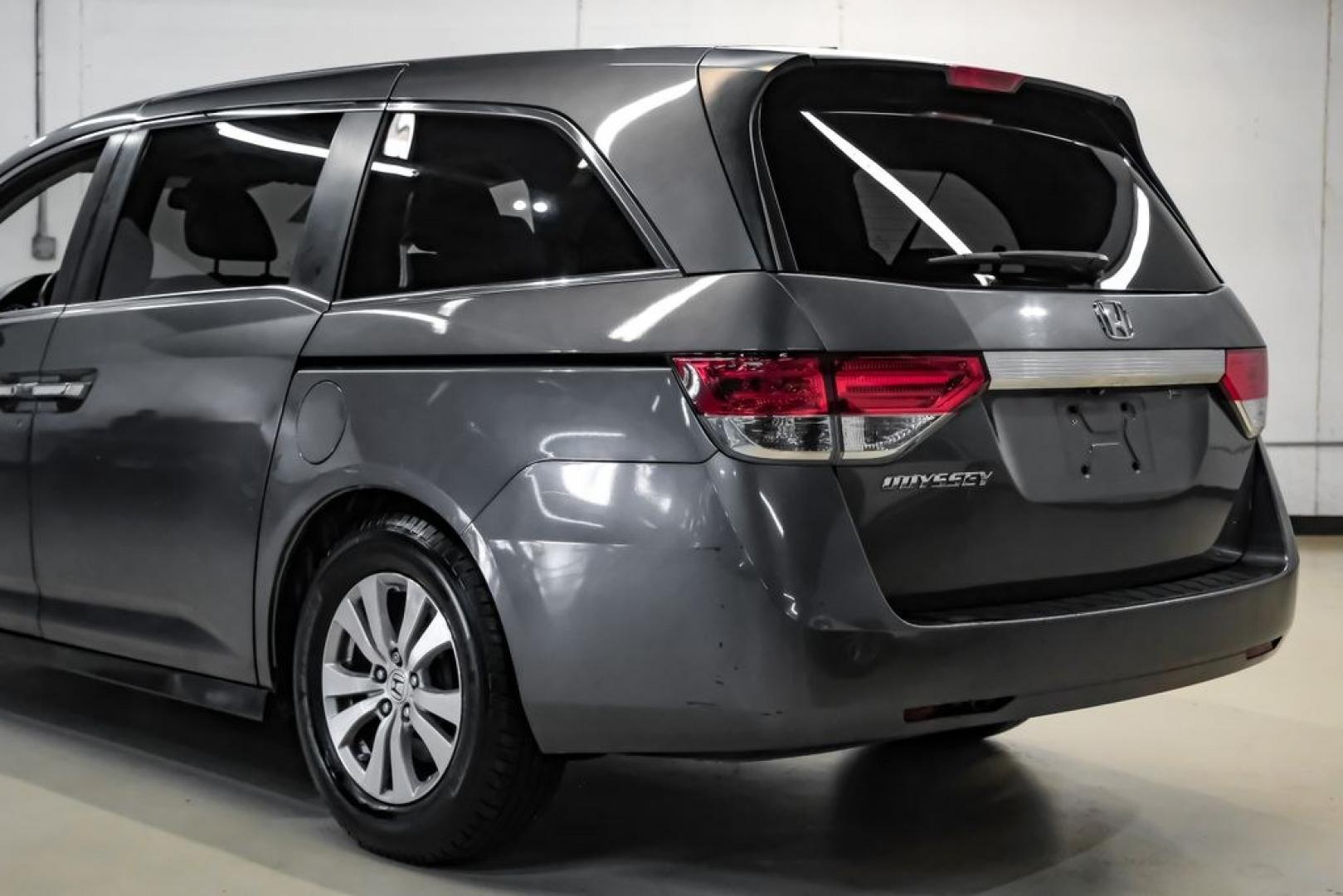 2014 Modern Steel Metallic /Beige Honda Odyssey EX-L (5FNRL5H69EB) with an 3.5L V6 SOHC i-VTEC 24V engine, Automatic transmission, located at 15300 Midway Rd., Addison, TX, 75001, (972) 702-0011, 32.958321, -96.838074- Photo#14