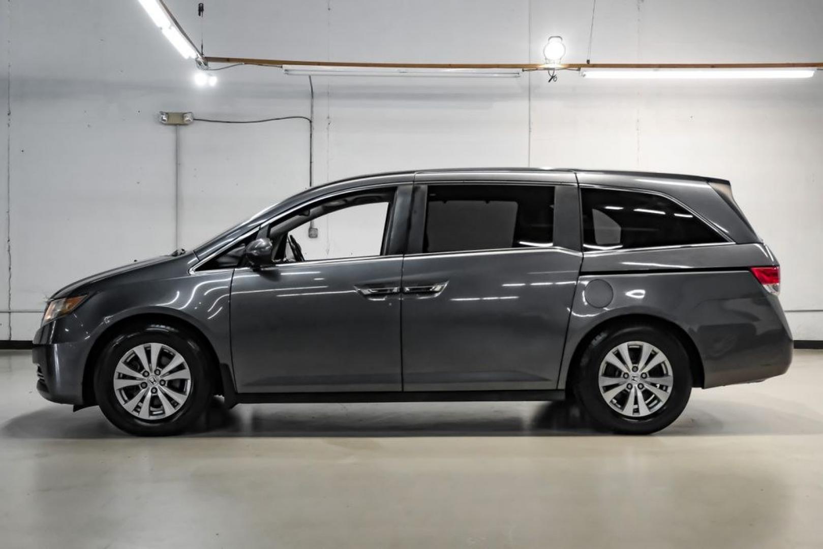 2014 Modern Steel Metallic /Beige Honda Odyssey EX-L (5FNRL5H69EB) with an 3.5L V6 SOHC i-VTEC 24V engine, Automatic transmission, located at 15300 Midway Rd., Addison, TX, 75001, (972) 702-0011, 32.958321, -96.838074- Photo#15