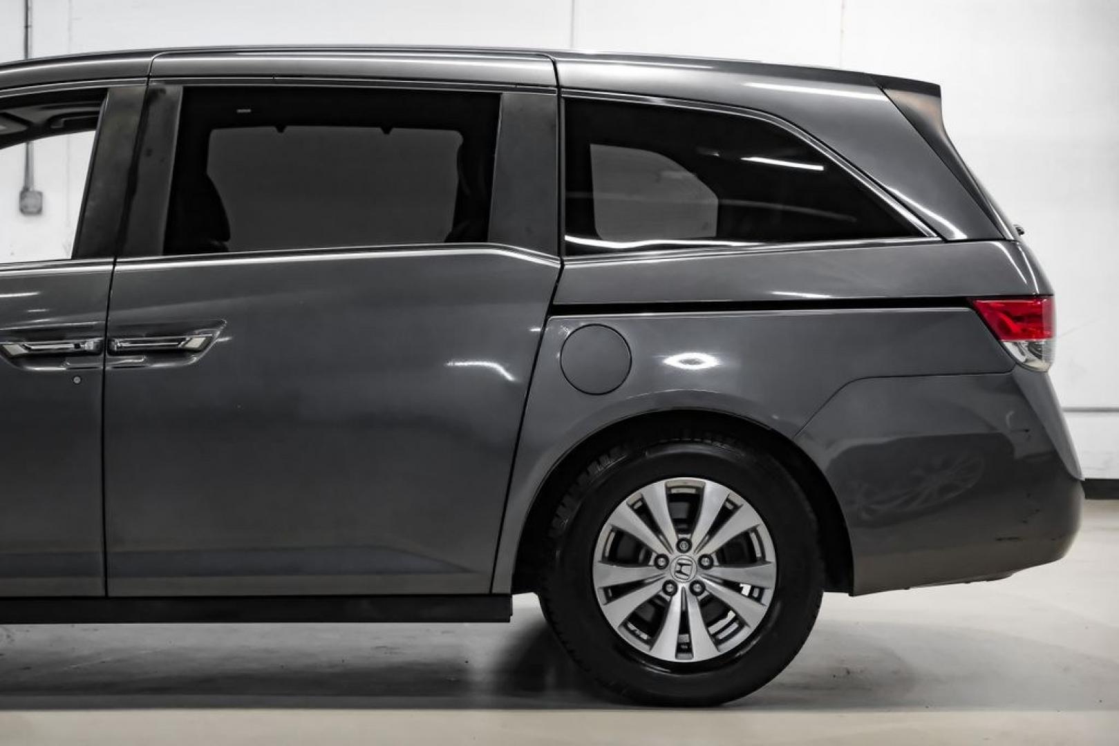 2014 Modern Steel Metallic /Beige Honda Odyssey EX-L (5FNRL5H69EB) with an 3.5L V6 SOHC i-VTEC 24V engine, Automatic transmission, located at 15300 Midway Rd., Addison, TX, 75001, (972) 702-0011, 32.958321, -96.838074- Photo#17