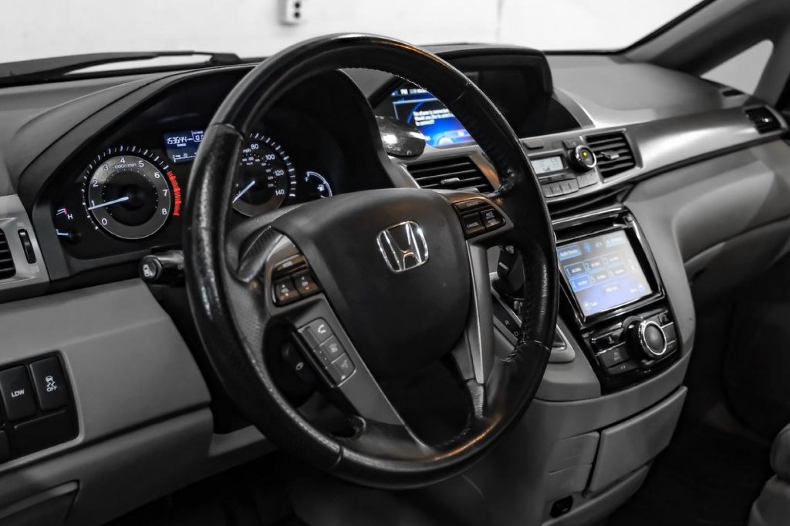 2014 Modern Steel Metallic /Beige Honda Odyssey EX-L (5FNRL5H69EB) with an 3.5L V6 SOHC i-VTEC 24V engine, Automatic transmission, located at 15300 Midway Rd., Addison, TX, 75001, (972) 702-0011, 32.958321, -96.838074- Photo#21