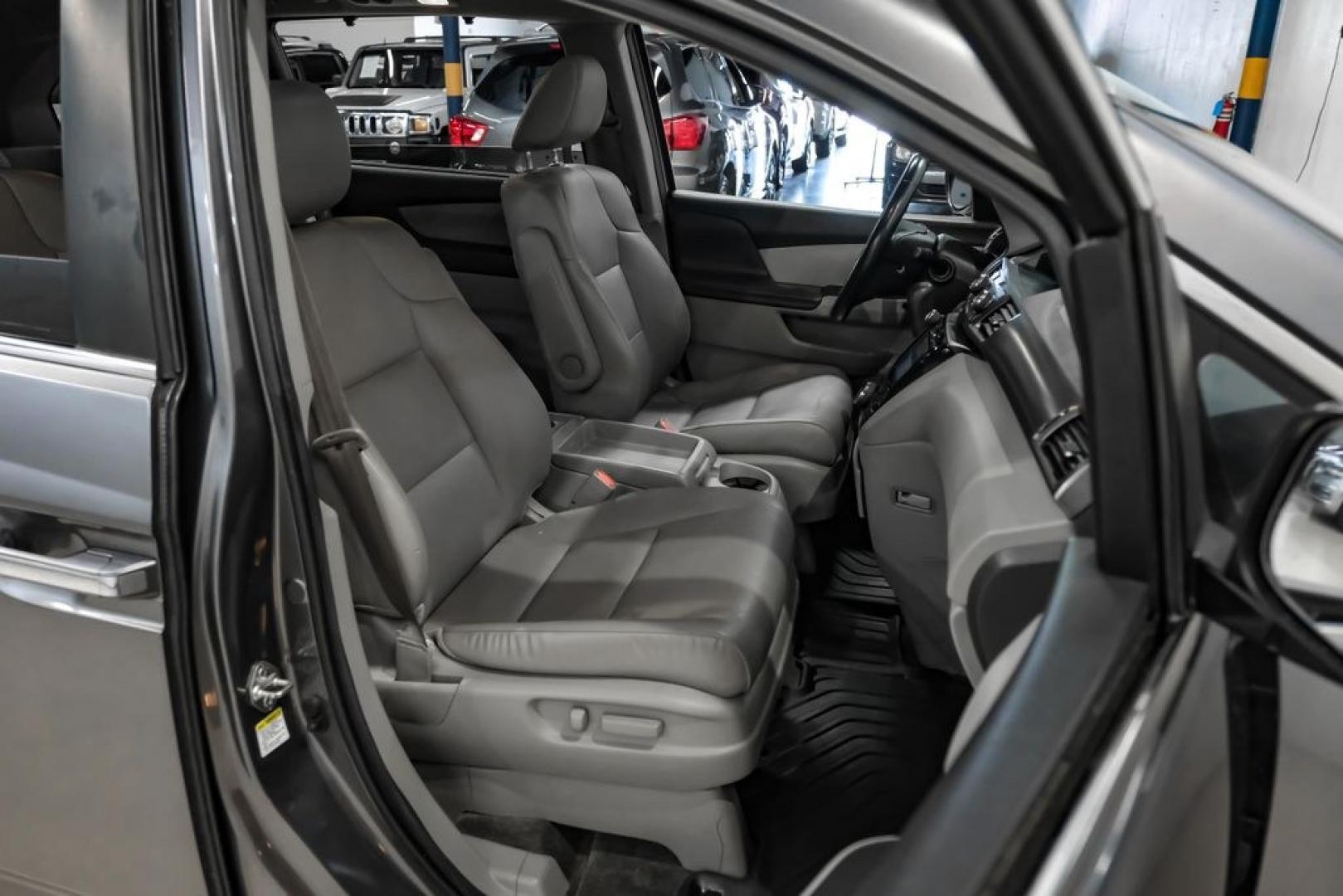 2014 Modern Steel Metallic /Beige Honda Odyssey EX-L (5FNRL5H69EB) with an 3.5L V6 SOHC i-VTEC 24V engine, Automatic transmission, located at 15300 Midway Rd., Addison, TX, 75001, (972) 702-0011, 32.958321, -96.838074- Photo#34