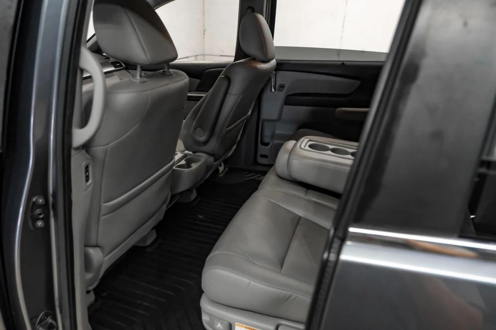 2014 Modern Steel Metallic /Beige Honda Odyssey EX-L (5FNRL5H69EB) with an 3.5L V6 SOHC i-VTEC 24V engine, Automatic transmission, located at 15300 Midway Rd., Addison, TX, 75001, (972) 702-0011, 32.958321, -96.838074- Photo#37