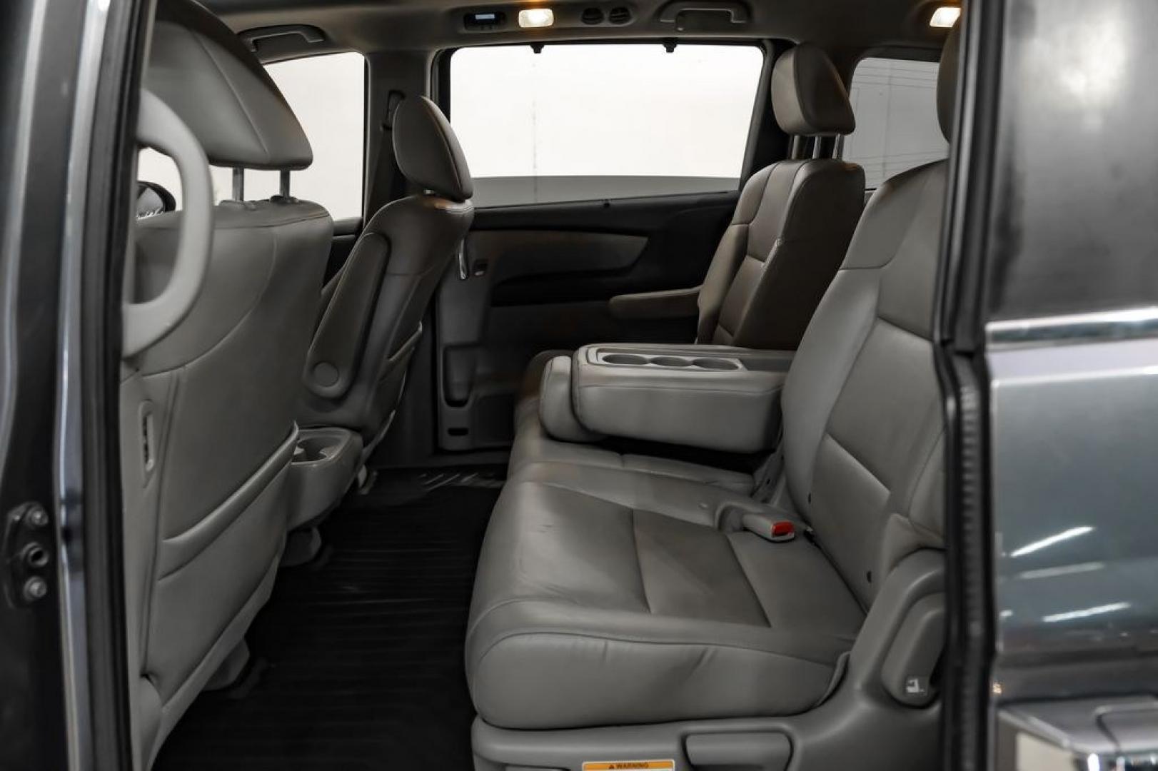 2014 Modern Steel Metallic /Beige Honda Odyssey EX-L (5FNRL5H69EB) with an 3.5L V6 SOHC i-VTEC 24V engine, Automatic transmission, located at 15300 Midway Rd., Addison, TX, 75001, (972) 702-0011, 32.958321, -96.838074- Photo#38