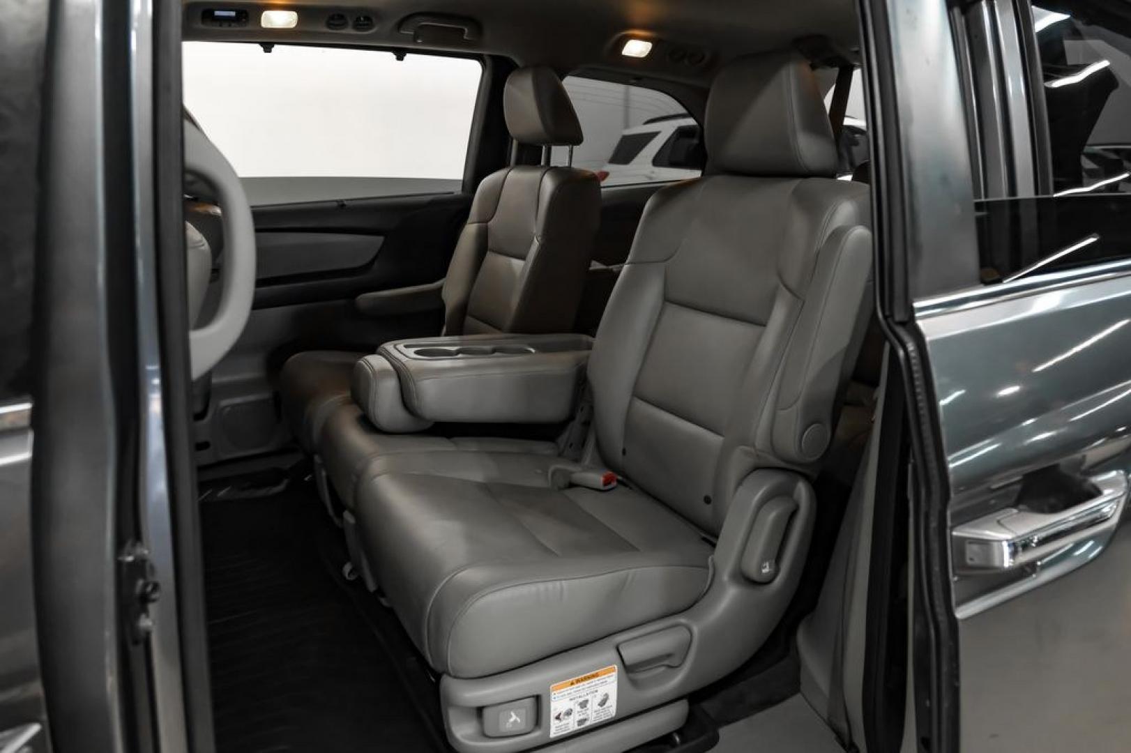 2014 Modern Steel Metallic /Beige Honda Odyssey EX-L (5FNRL5H69EB) with an 3.5L V6 SOHC i-VTEC 24V engine, Automatic transmission, located at 15300 Midway Rd., Addison, TX, 75001, (972) 702-0011, 32.958321, -96.838074- Photo#39
