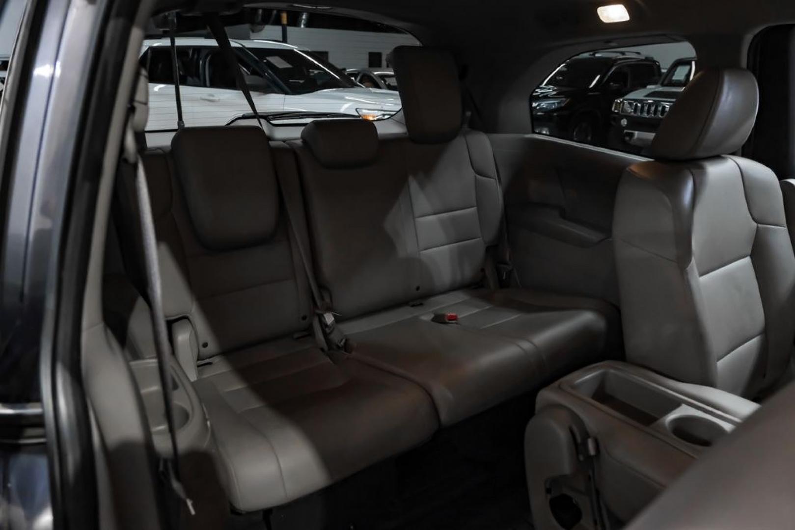 2014 Modern Steel Metallic /Beige Honda Odyssey EX-L (5FNRL5H69EB) with an 3.5L V6 SOHC i-VTEC 24V engine, Automatic transmission, located at 15300 Midway Rd., Addison, TX, 75001, (972) 702-0011, 32.958321, -96.838074- Photo#40