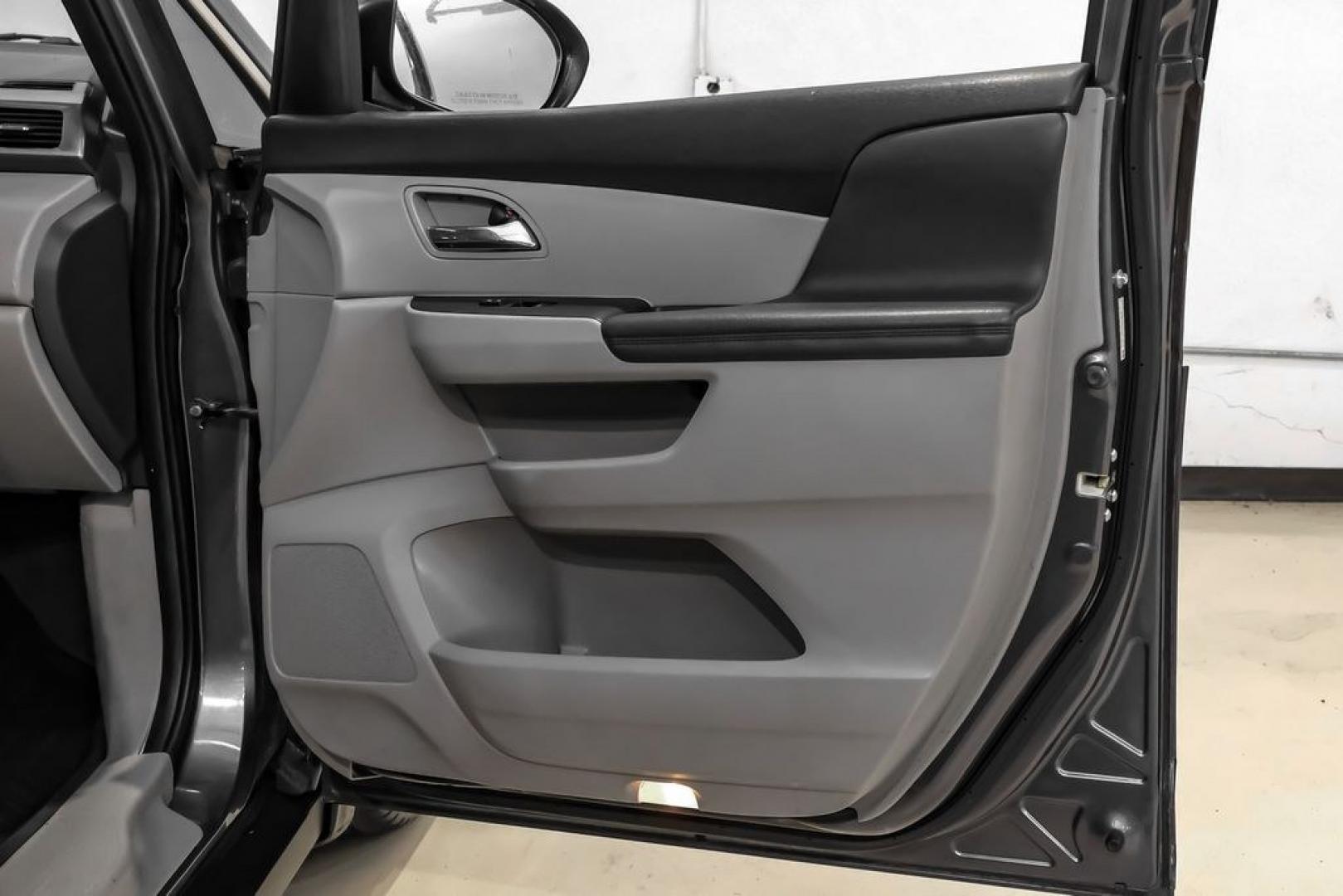 2014 Modern Steel Metallic /Beige Honda Odyssey EX-L (5FNRL5H69EB) with an 3.5L V6 SOHC i-VTEC 24V engine, Automatic transmission, located at 15300 Midway Rd., Addison, TX, 75001, (972) 702-0011, 32.958321, -96.838074- Photo#45