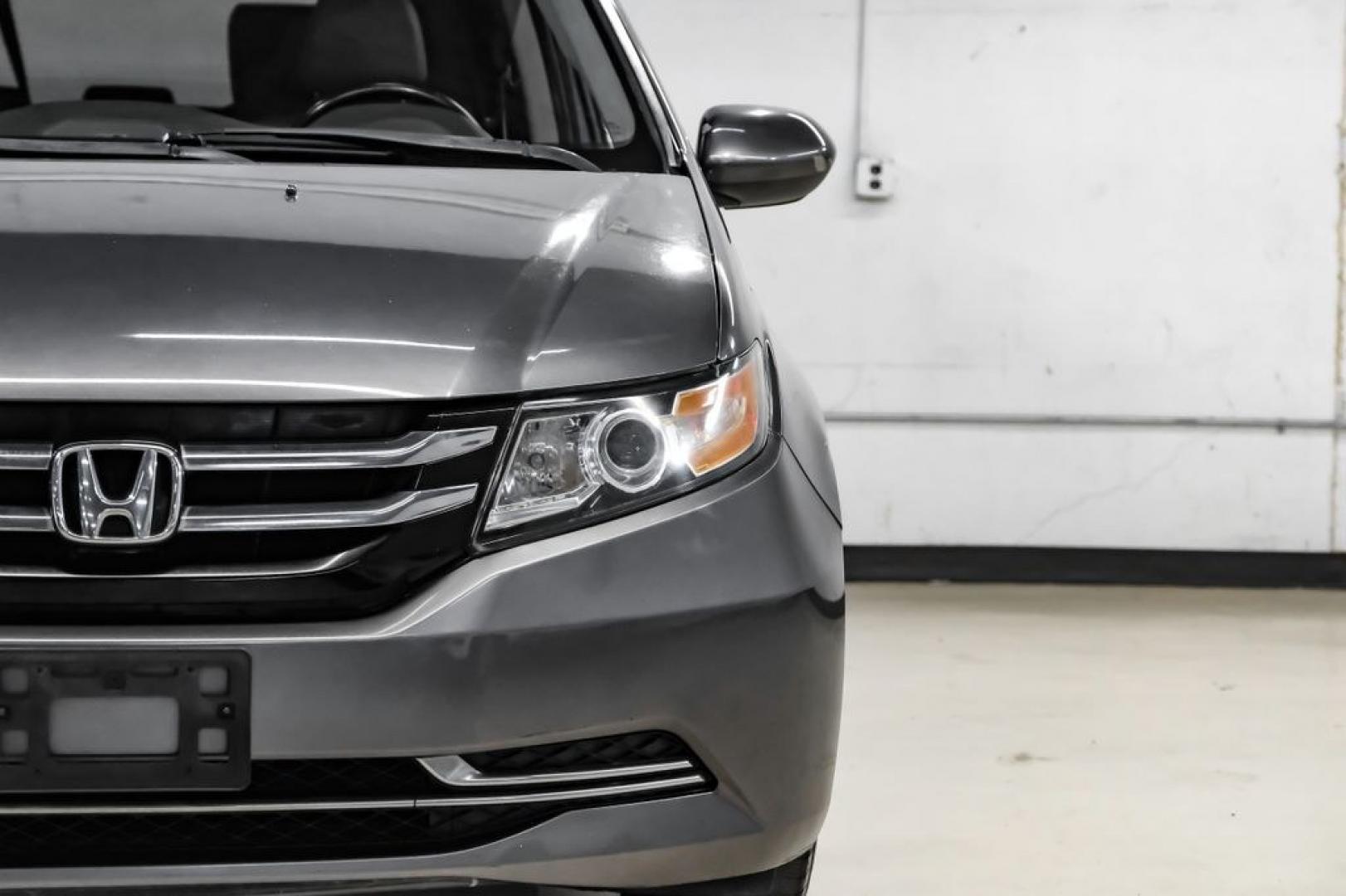 2014 Modern Steel Metallic /Beige Honda Odyssey EX-L (5FNRL5H69EB) with an 3.5L V6 SOHC i-VTEC 24V engine, Automatic transmission, located at 15300 Midway Rd., Addison, TX, 75001, (972) 702-0011, 32.958321, -96.838074- Photo#46