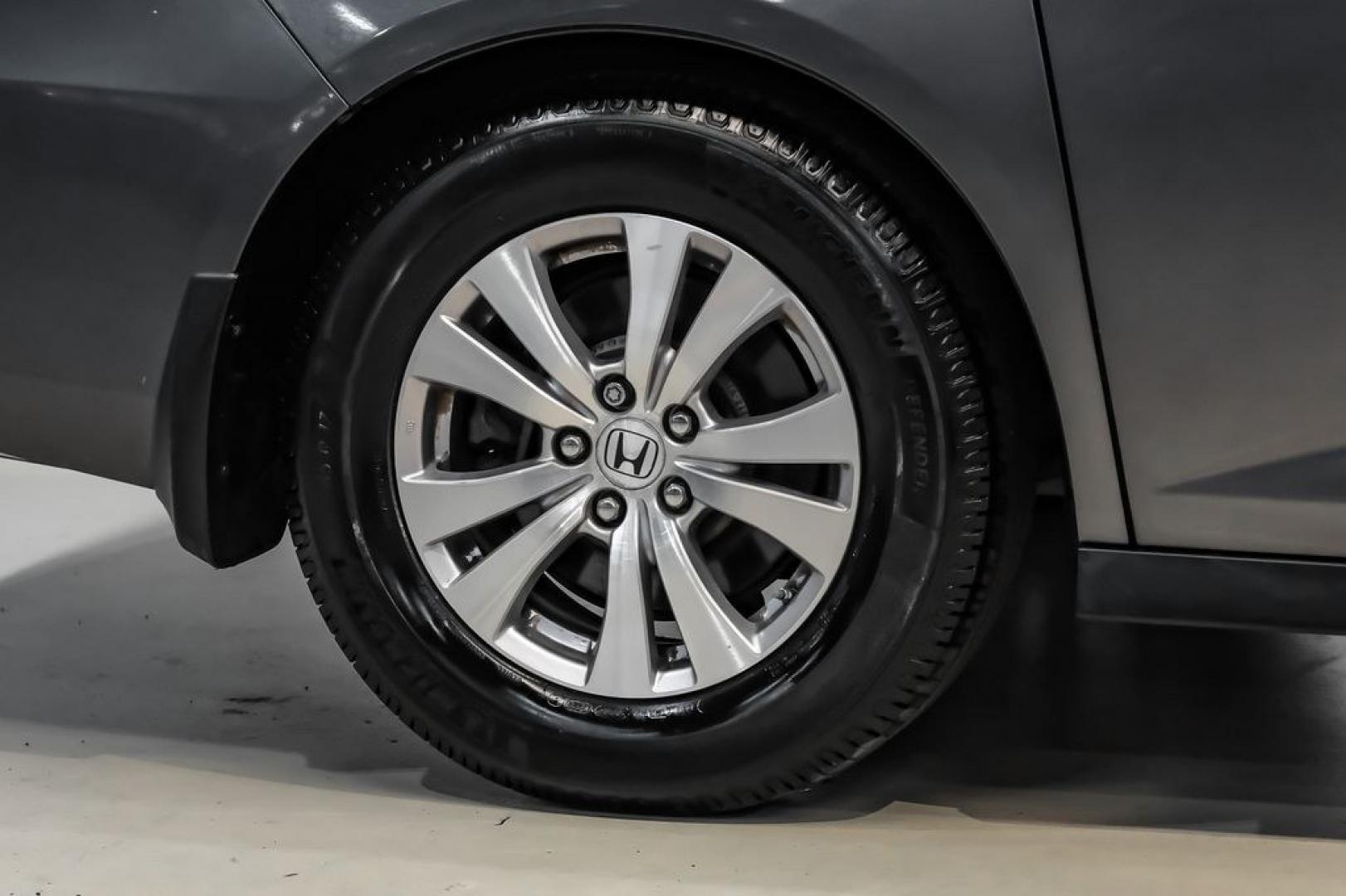 2014 Modern Steel Metallic /Beige Honda Odyssey EX-L (5FNRL5H69EB) with an 3.5L V6 SOHC i-VTEC 24V engine, Automatic transmission, located at 15300 Midway Rd., Addison, TX, 75001, (972) 702-0011, 32.958321, -96.838074- Photo#53