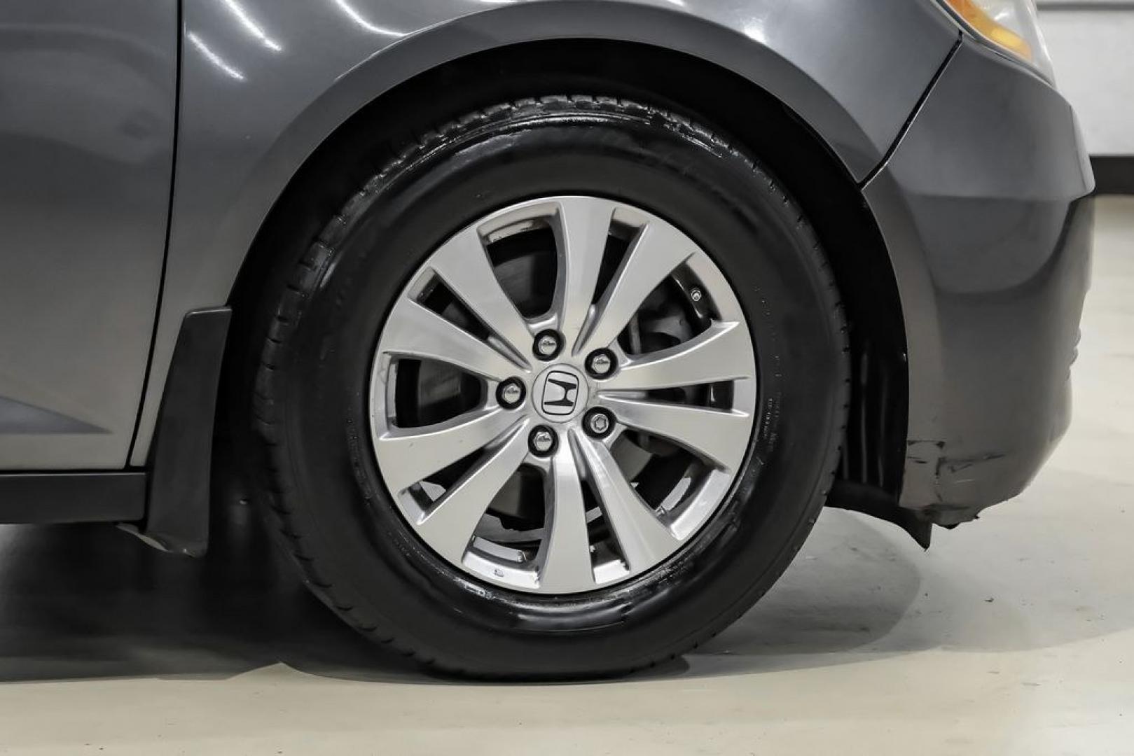 2014 Modern Steel Metallic /Beige Honda Odyssey EX-L (5FNRL5H69EB) with an 3.5L V6 SOHC i-VTEC 24V engine, Automatic transmission, located at 15300 Midway Rd., Addison, TX, 75001, (972) 702-0011, 32.958321, -96.838074- Photo#54