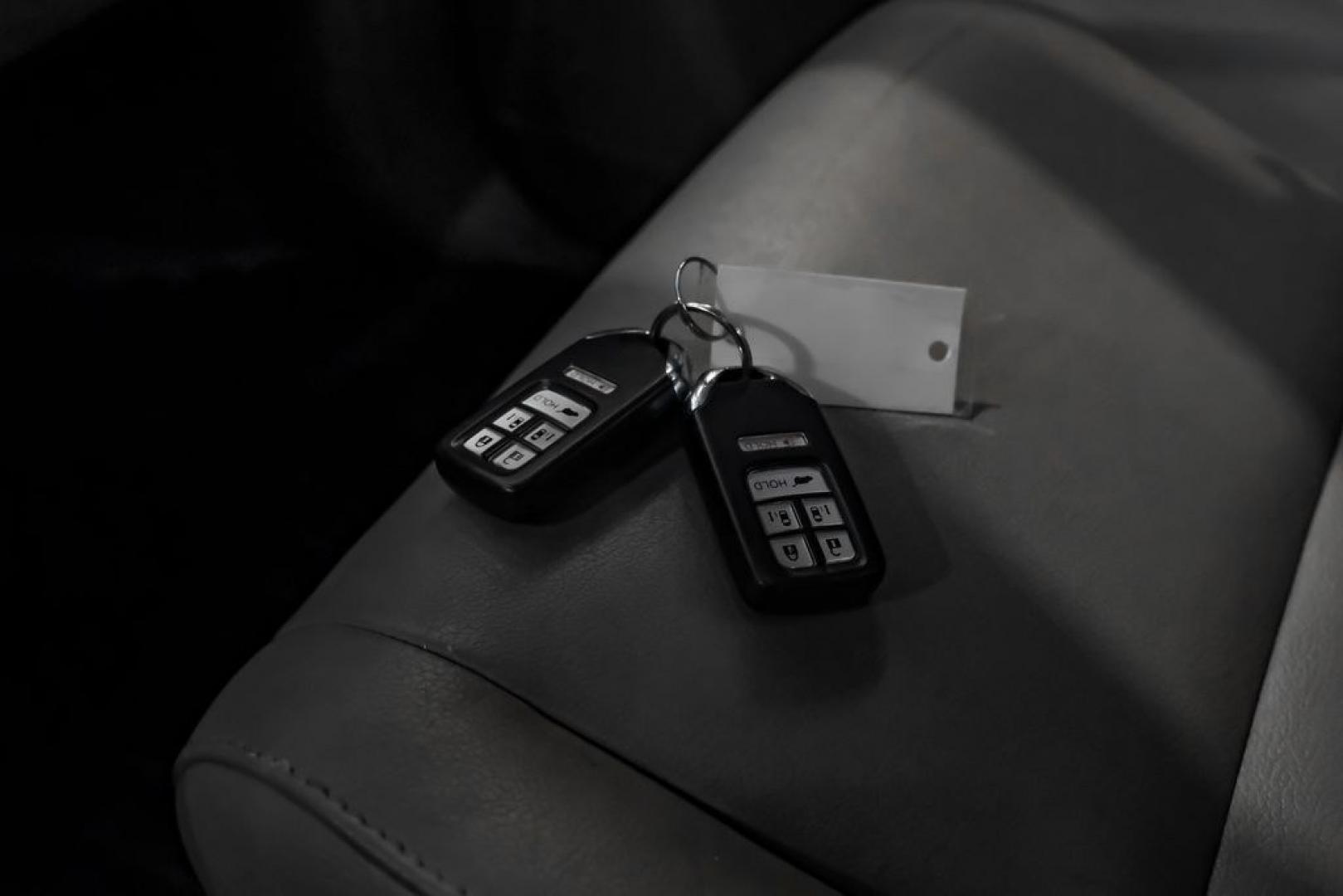 2014 Modern Steel Metallic /Beige Honda Odyssey EX-L (5FNRL5H69EB) with an 3.5L V6 SOHC i-VTEC 24V engine, Automatic transmission, located at 15300 Midway Rd., Addison, TX, 75001, (972) 702-0011, 32.958321, -96.838074- Photo#57