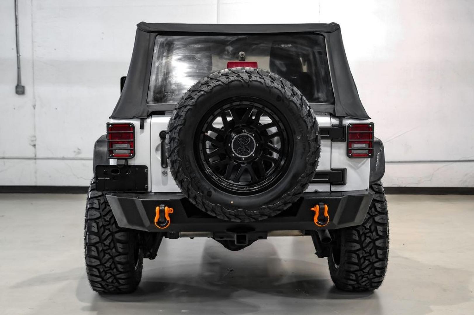 2015 Bright White Clearcoat /Black Jeep Wrangler Sport (1C4AJWAG4FL) with an 3.6L V6 24V VVT engine, Automatic transmission, located at 15300 Midway Rd., Addison, TX, 75001, (972) 702-0011, 32.958321, -96.838074- Photo#4