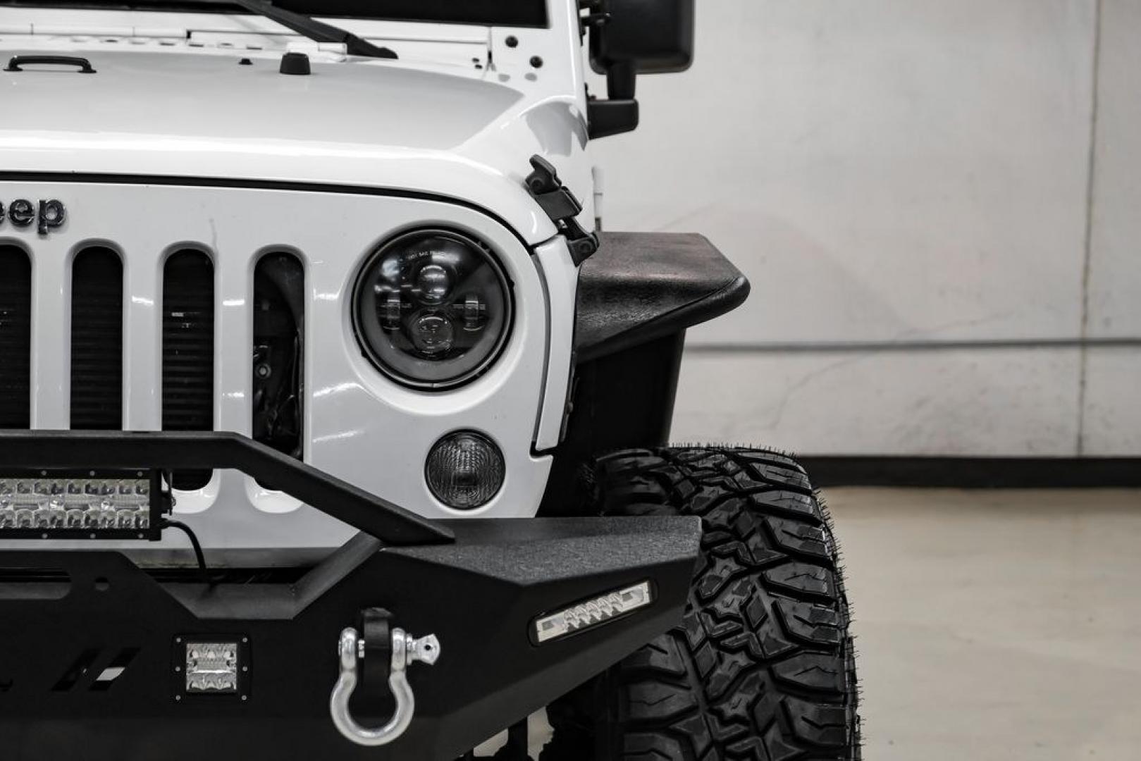 2015 Bright White Clearcoat /Black Jeep Wrangler Sport (1C4AJWAG4FL) with an 3.6L V6 24V VVT engine, Automatic transmission, located at 15300 Midway Rd., Addison, TX, 75001, (972) 702-0011, 32.958321, -96.838074- Photo#28