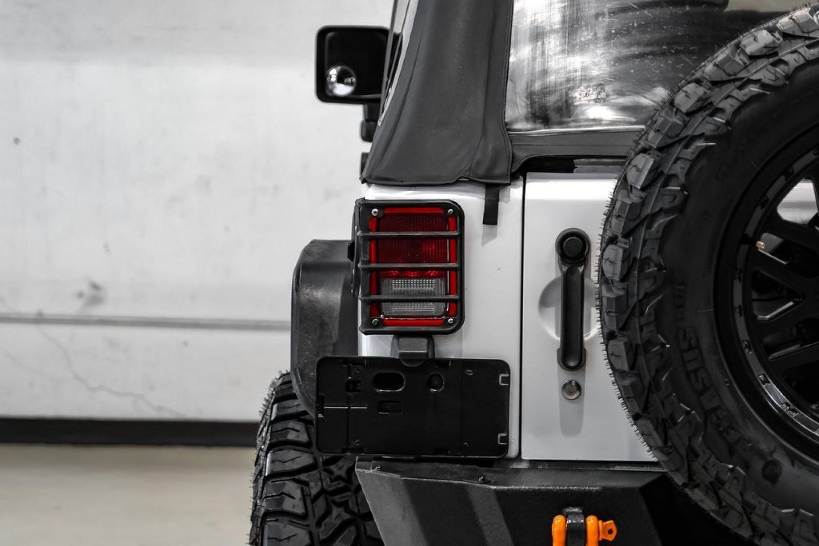 2015 Bright White Clearcoat /Black Jeep Wrangler Sport (1C4AJWAG4FL) with an 3.6L V6 24V VVT engine, Automatic transmission, located at 15300 Midway Rd., Addison, TX, 75001, (972) 702-0011, 32.958321, -96.838074- Photo#29