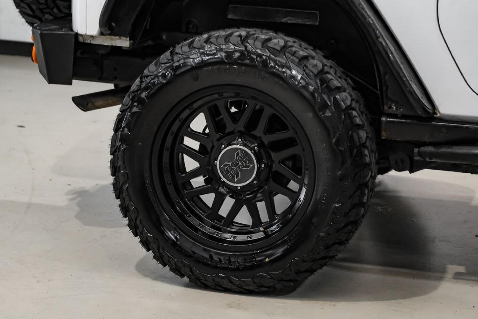 2015 Bright White Clearcoat /Black Jeep Wrangler Sport (1C4AJWAG4FL) with an 3.6L V6 24V VVT engine, Automatic transmission, located at 15300 Midway Rd., Addison, TX, 75001, (972) 702-0011, 32.958321, -96.838074- Photo#36