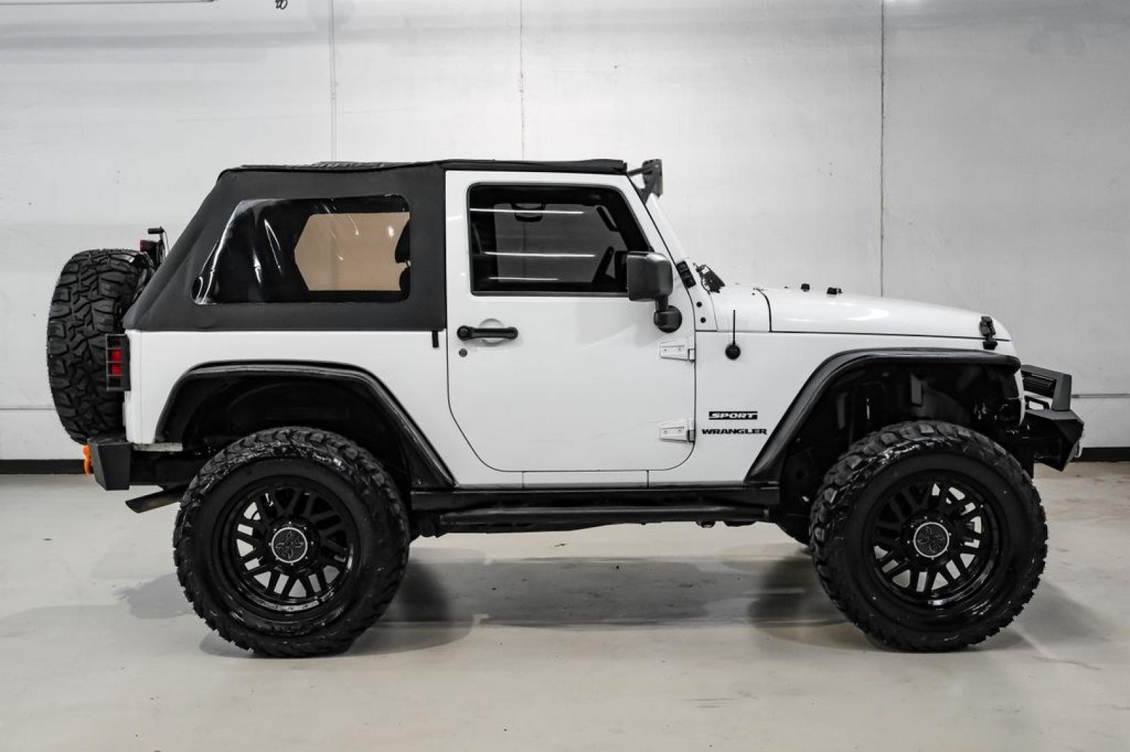 2015 Bright White Clearcoat /Black Jeep Wrangler Sport (1C4AJWAG4FL) with an 3.6L V6 24V VVT engine, Automatic transmission, located at 15300 Midway Rd., Addison, TX, 75001, (972) 702-0011, 32.958321, -96.838074- Photo#45
