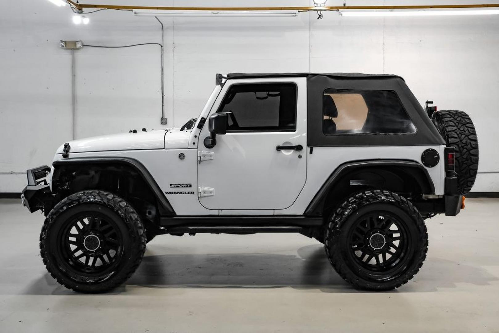 2015 Bright White Clearcoat /Black Jeep Wrangler Sport (1C4AJWAG4FL) with an 3.6L V6 24V VVT engine, Automatic transmission, located at 15300 Midway Rd., Addison, TX, 75001, (972) 702-0011, 32.958321, -96.838074- Photo#46