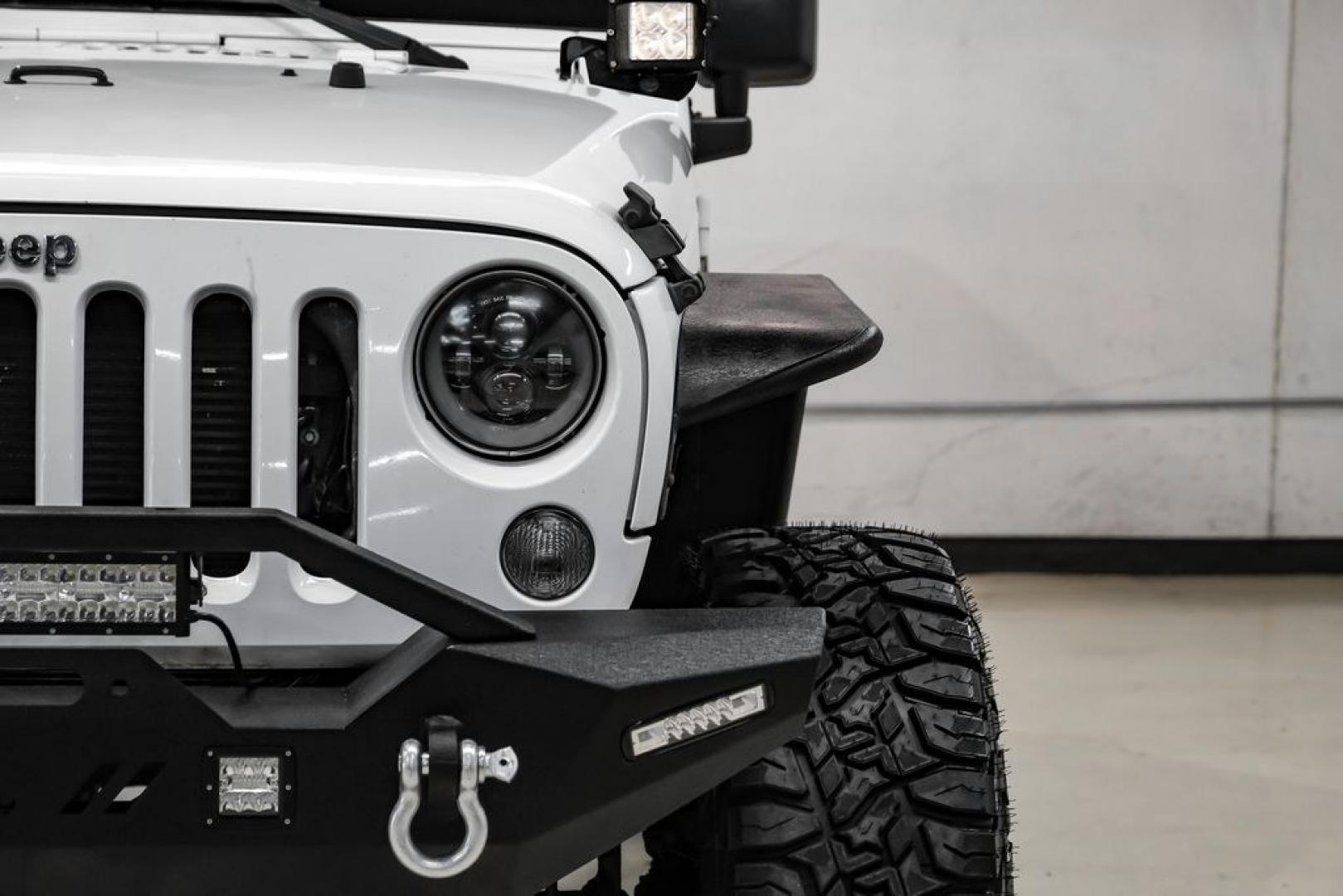 2015 Bright White Clearcoat /Black Jeep Wrangler Sport (1C4AJWAG4FL) with an 3.6L V6 24V VVT engine, Automatic transmission, located at 15300 Midway Rd., Addison, TX, 75001, (972) 702-0011, 32.958321, -96.838074- Photo#47