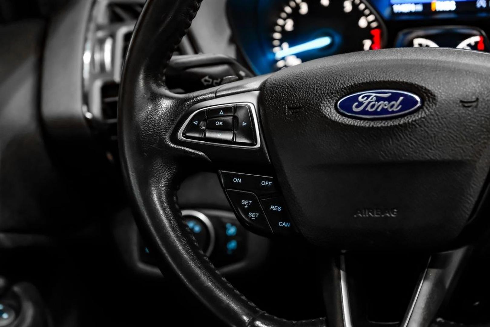 2017 Ingot Silver /Black Ford Escape Titanium (1FMCU0JD8HU) with an 1.5L EcoBoost engine, Automatic transmission, located at 15300 Midway Rd., Addison, TX, 75001, (972) 702-0011, 32.958321, -96.838074- Photo#15