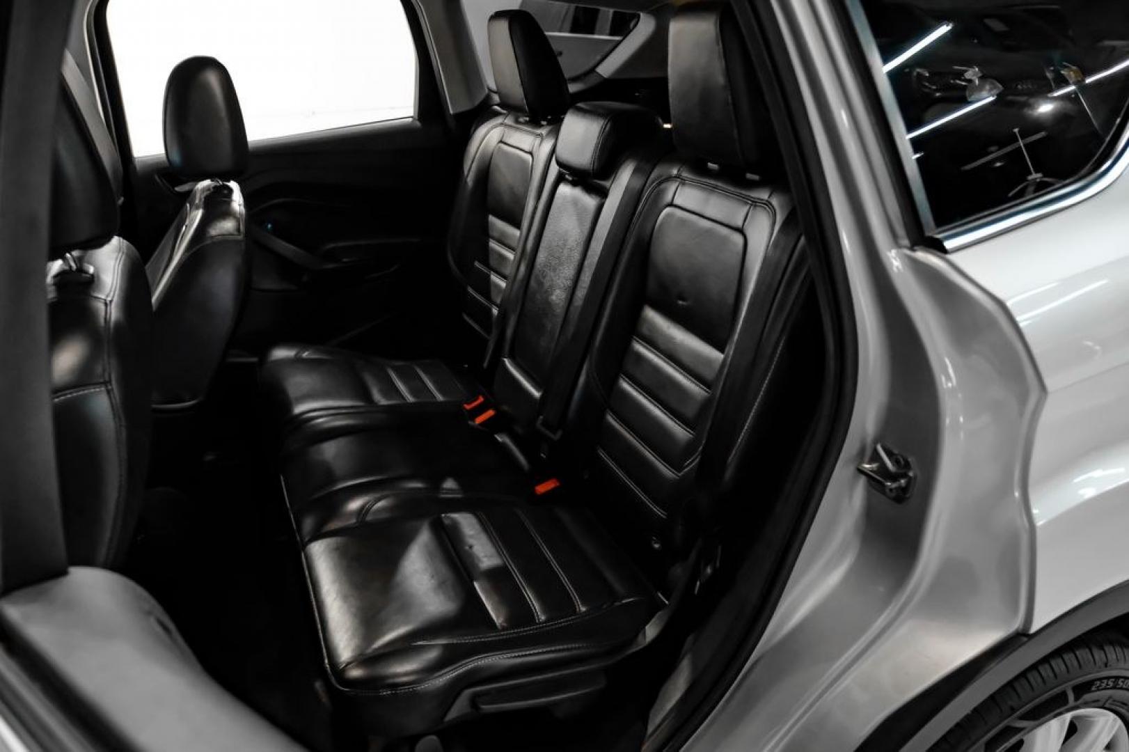 2017 Ingot Silver /Black Ford Escape Titanium (1FMCU0JD8HU) with an 1.5L EcoBoost engine, Automatic transmission, located at 15300 Midway Rd., Addison, TX, 75001, (972) 702-0011, 32.958321, -96.838074- Photo#37