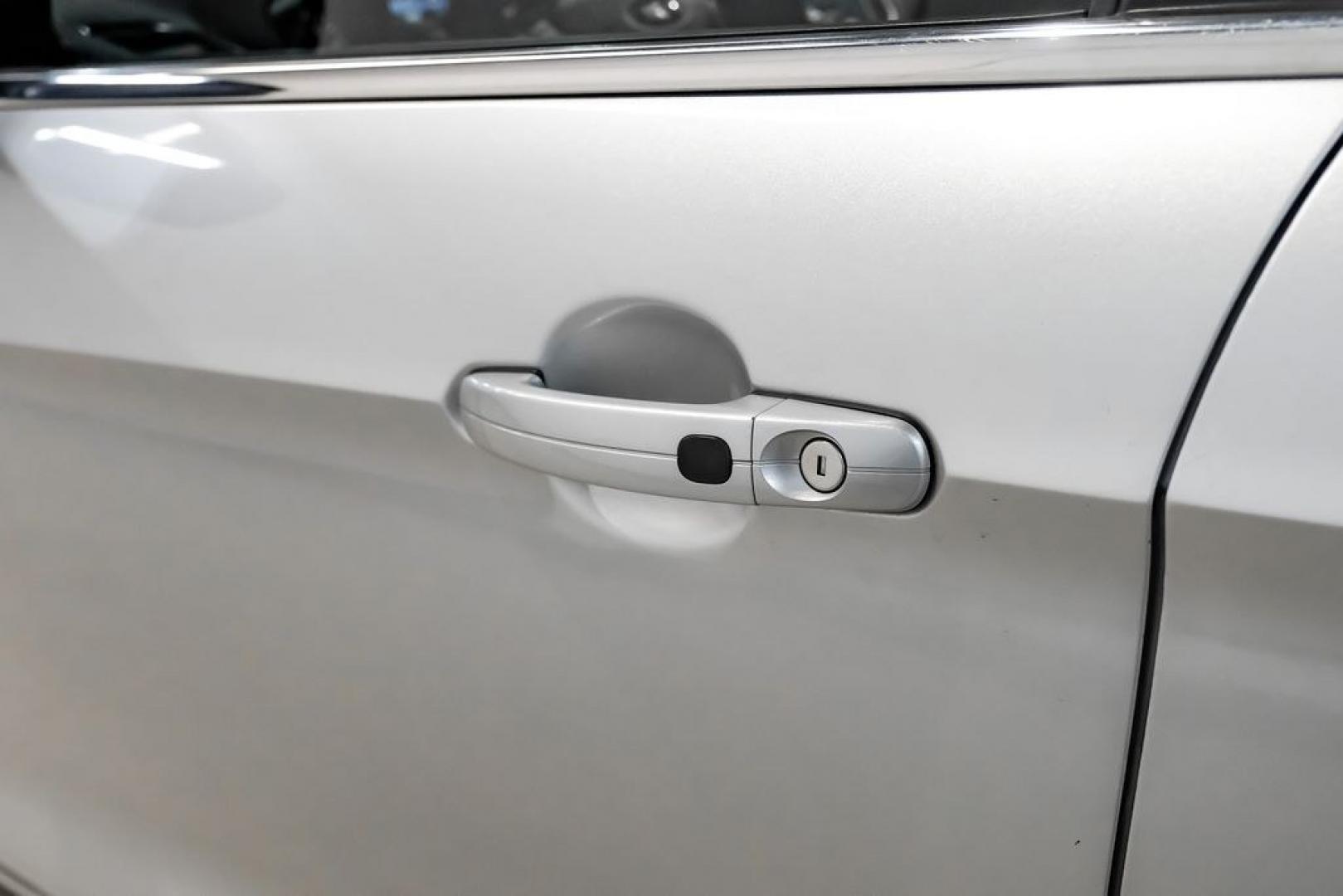 2017 Ingot Silver /Black Ford Escape Titanium (1FMCU0JD8HU) with an 1.5L EcoBoost engine, Automatic transmission, located at 15300 Midway Rd., Addison, TX, 75001, (972) 702-0011, 32.958321, -96.838074- Photo#39