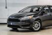 2016 Magnetic /Black Ford Focus SE (1FADP3F22GL) with an 2.0L 4-Cylinder DGI Flex Fuel DOHC engine, Automatic transmission, located at 15300 Midway Rd., Addison, TX, 75001, (972) 702-0011, 32.958321, -96.838074- Photo#4