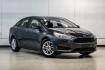 2016 Magnetic /Black Ford Focus SE (1FADP3F22GL) with an 2.0L 4-Cylinder DGI Flex Fuel DOHC engine, Automatic transmission, located at 15300 Midway Rd., Addison, TX, 75001, (972) 702-0011, 32.958321, -96.838074- Photo#7