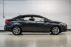 2016 Magnetic /Black Ford Focus SE (1FADP3F22GL) with an 2.0L 4-Cylinder DGI Flex Fuel DOHC engine, Automatic transmission, located at 15300 Midway Rd., Addison, TX, 75001, (972) 702-0011, 32.958321, -96.838074- Photo#8