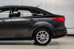 2016 Magnetic /Black Ford Focus SE (1FADP3F22GL) with an 2.0L 4-Cylinder DGI Flex Fuel DOHC engine, Automatic transmission, located at 15300 Midway Rd., Addison, TX, 75001, (972) 702-0011, 32.958321, -96.838074- Photo#18