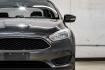 2016 Magnetic /Black Ford Focus SE (1FADP3F22GL) with an 2.0L 4-Cylinder DGI Flex Fuel DOHC engine, Automatic transmission, located at 15300 Midway Rd., Addison, TX, 75001, (972) 702-0011, 32.958321, -96.838074- Photo#57