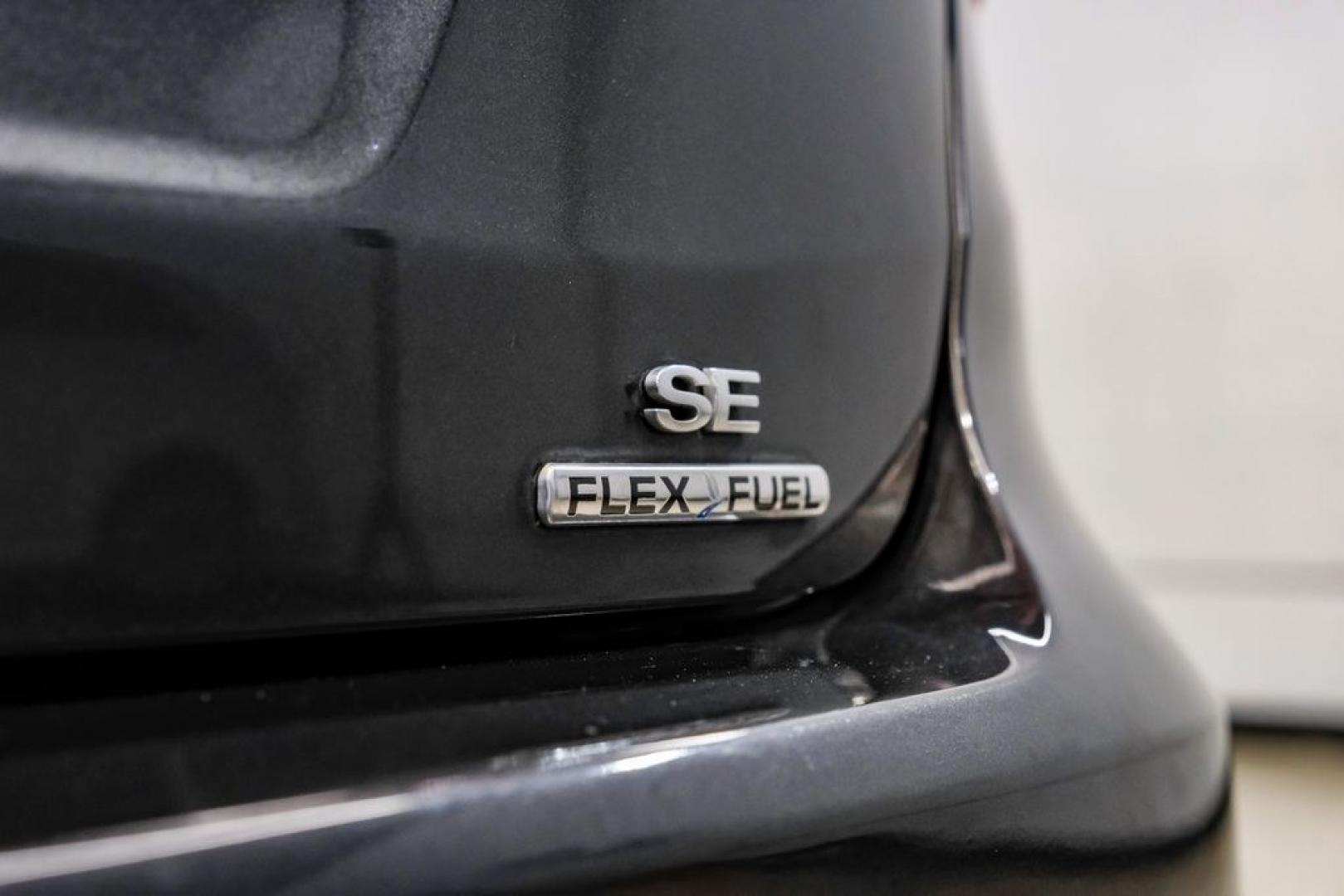 2016 Magnetic /Black Ford Focus SE (1FADP3F22GL) with an 2.0L 4-Cylinder DGI Flex Fuel DOHC engine, Automatic transmission, located at 15300 Midway Rd., Addison, TX, 75001, (972) 702-0011, 32.958321, -96.838074- Photo#59