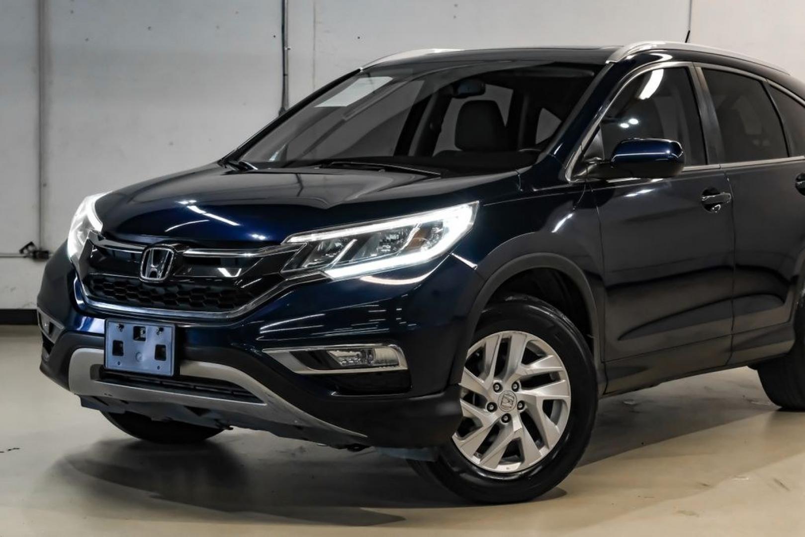 2015 Obsidian Blue Pearl /Gray Honda CR-V EX-L (2HKRM3H71FH) with an 2.4L I4 DOHC 16V i-VTEC engine, CVT transmission, located at 15300 Midway Rd., Addison, TX, 75001, (972) 702-0011, 32.958321, -96.838074- Photo#4