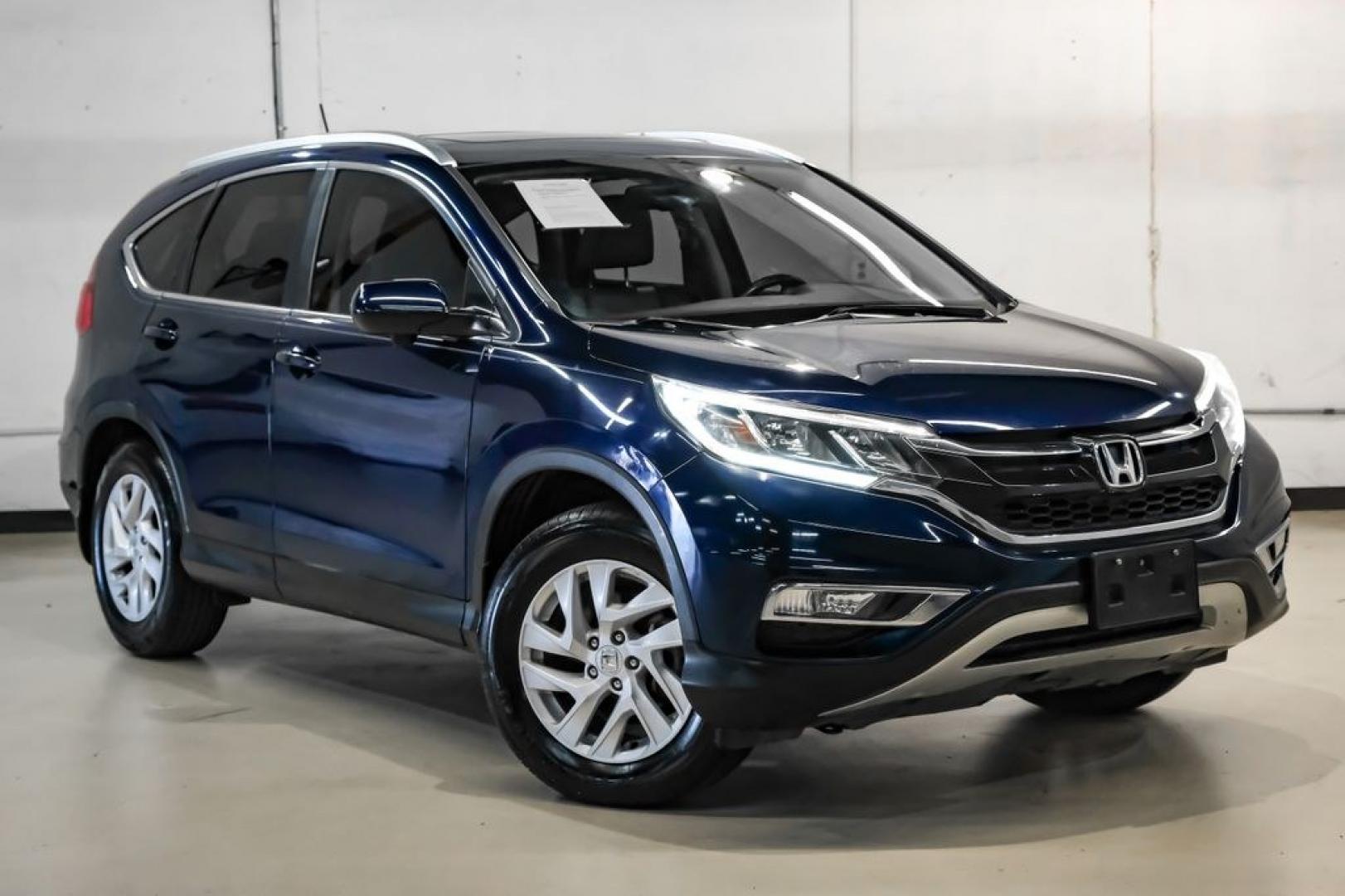 2015 Obsidian Blue Pearl /Gray Honda CR-V EX-L (2HKRM3H71FH) with an 2.4L I4 DOHC 16V i-VTEC engine, CVT transmission, located at 15300 Midway Rd., Addison, TX, 75001, (972) 702-0011, 32.958321, -96.838074- Photo#7