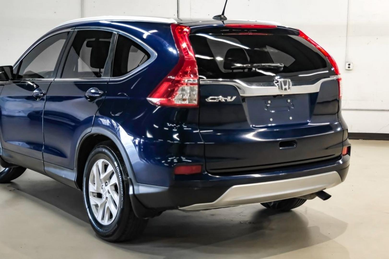 2015 Obsidian Blue Pearl /Gray Honda CR-V EX-L (2HKRM3H71FH) with an 2.4L I4 DOHC 16V i-VTEC engine, CVT transmission, located at 15300 Midway Rd., Addison, TX, 75001, (972) 702-0011, 32.958321, -96.838074- Photo#13