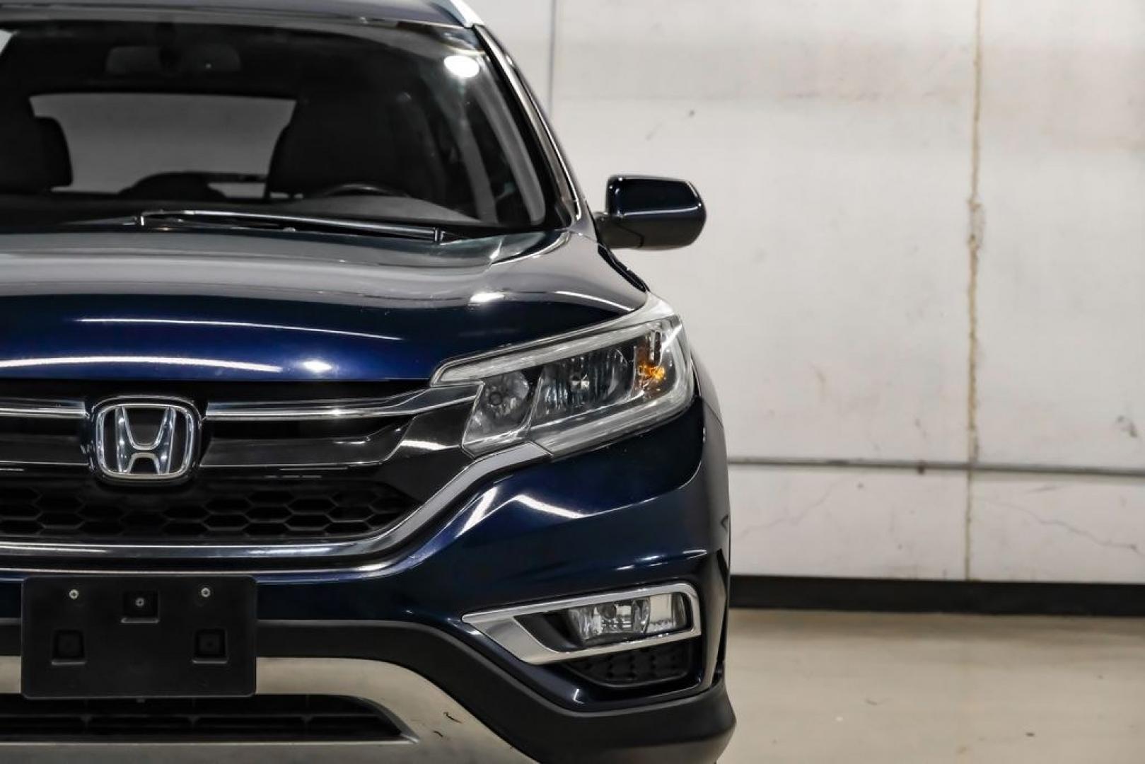 2015 Obsidian Blue Pearl /Gray Honda CR-V EX-L (2HKRM3H71FH) with an 2.4L I4 DOHC 16V i-VTEC engine, CVT transmission, located at 15300 Midway Rd., Addison, TX, 75001, (972) 702-0011, 32.958321, -96.838074- Photo#46