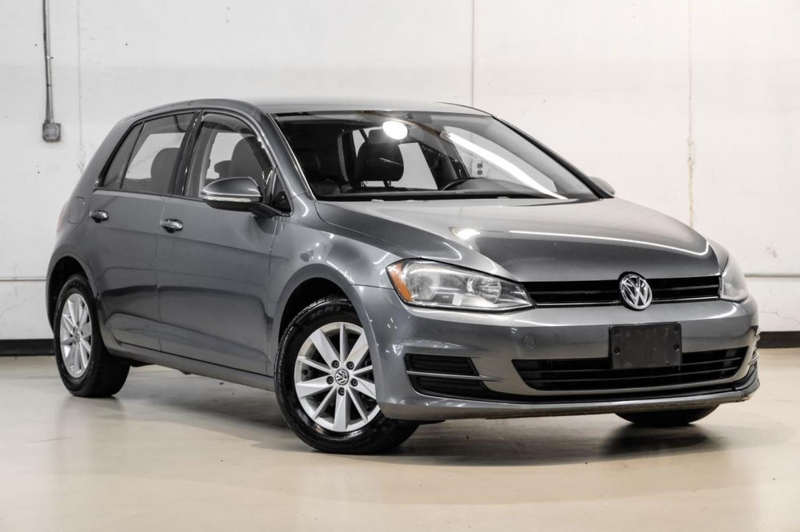 2015 Platinum Gray Metallic /Titan Black Volkswagen Golf TSI S 4-Door (3VW217AU0FM) with an 1.8L I4 Turbocharged DOHC 16V ULEV II 170hp engine, Automatic transmission, located at 15300 Midway Rd., Addison, TX, 75001, (972) 702-0011, 32.958321, -96.838074- Photo#5
