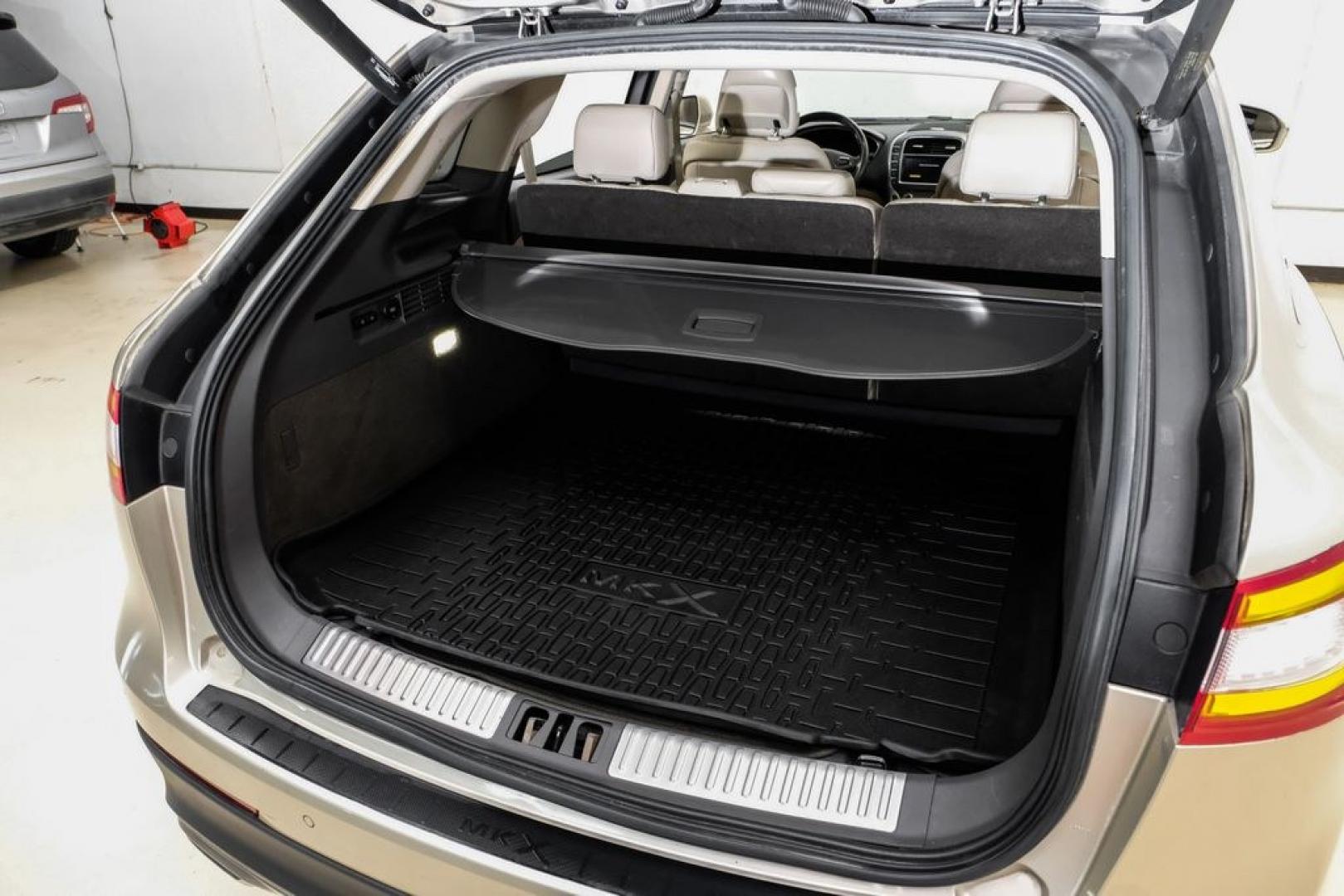 2017 White Gold Metallic /Cappuccino Lincoln MKX Reserve (2LMPJ6LR8HB) with an 3.7L V6 Ti-VCT 24V engine, Automatic transmission, located at 15300 Midway Rd., Addison, TX, 75001, (972) 702-0011, 32.958321, -96.838074- Photo#49