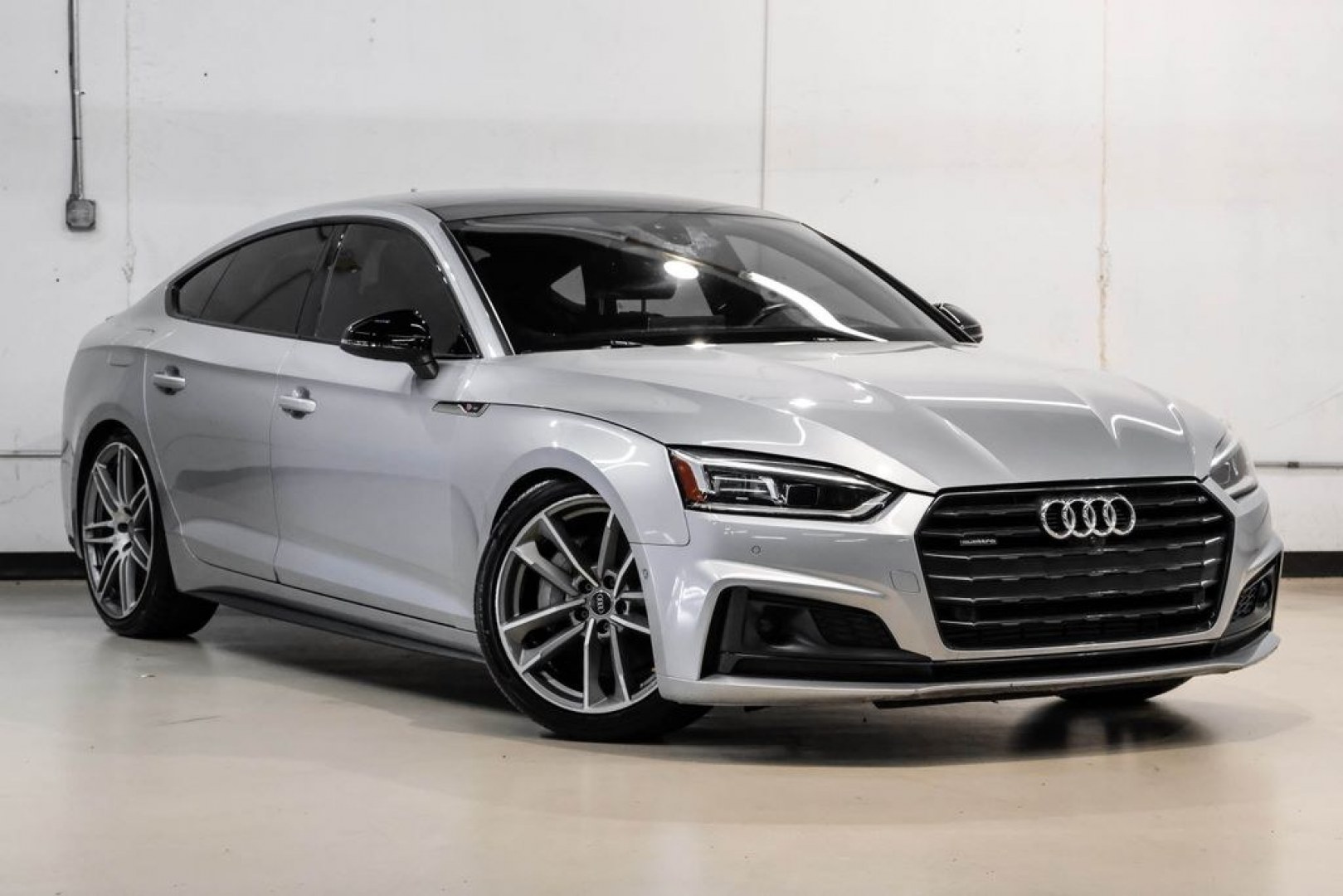 2019 Silver Metallic /Black Audi A5 Sportback Prestige (WAUFNCF55KA) with an 2.0L 4-Cylinder TFSI engine, Automatic transmission, located at 15300 Midway Rd., Addison, TX, 75001, (972) 702-0011, 32.958321, -96.838074- Photo#6
